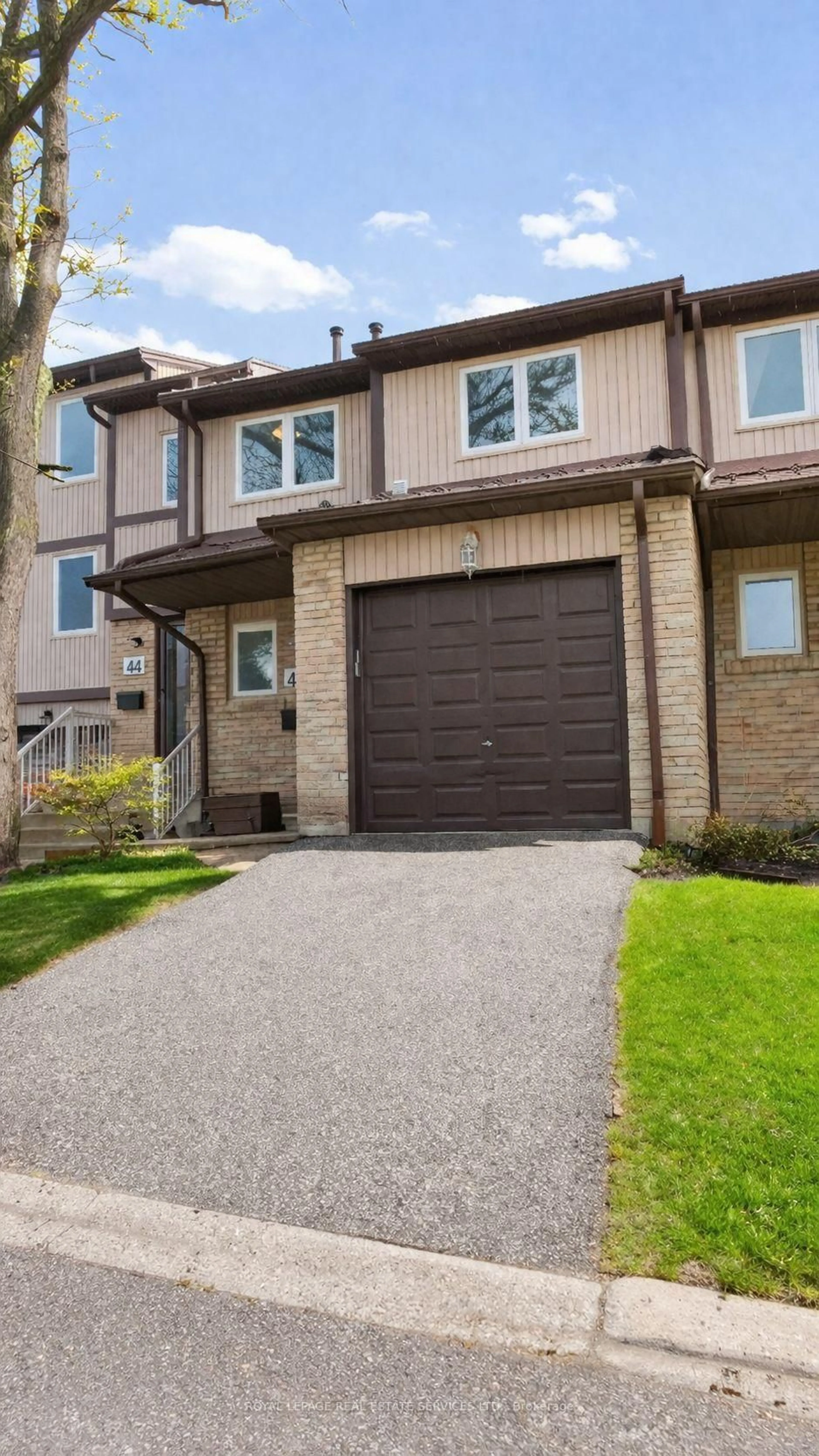 Home with brick exterior material, street for 6449 Glen Erin Dr #43, Mississauga Ontario L5N 2T2