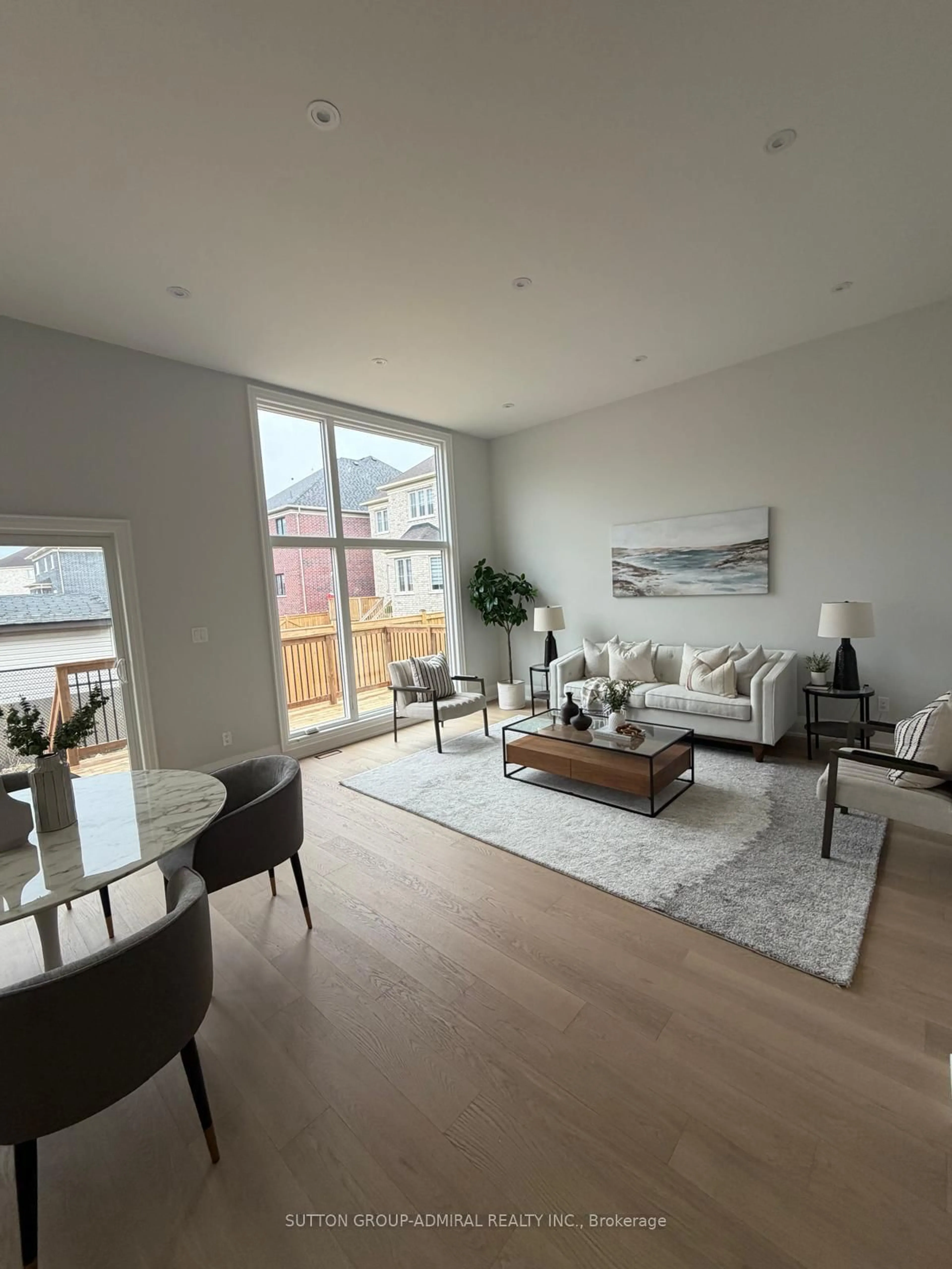 Living room with furniture, wood/laminate floor for 24 Valleywest Rd, Brampton Ontario L6P 2J9