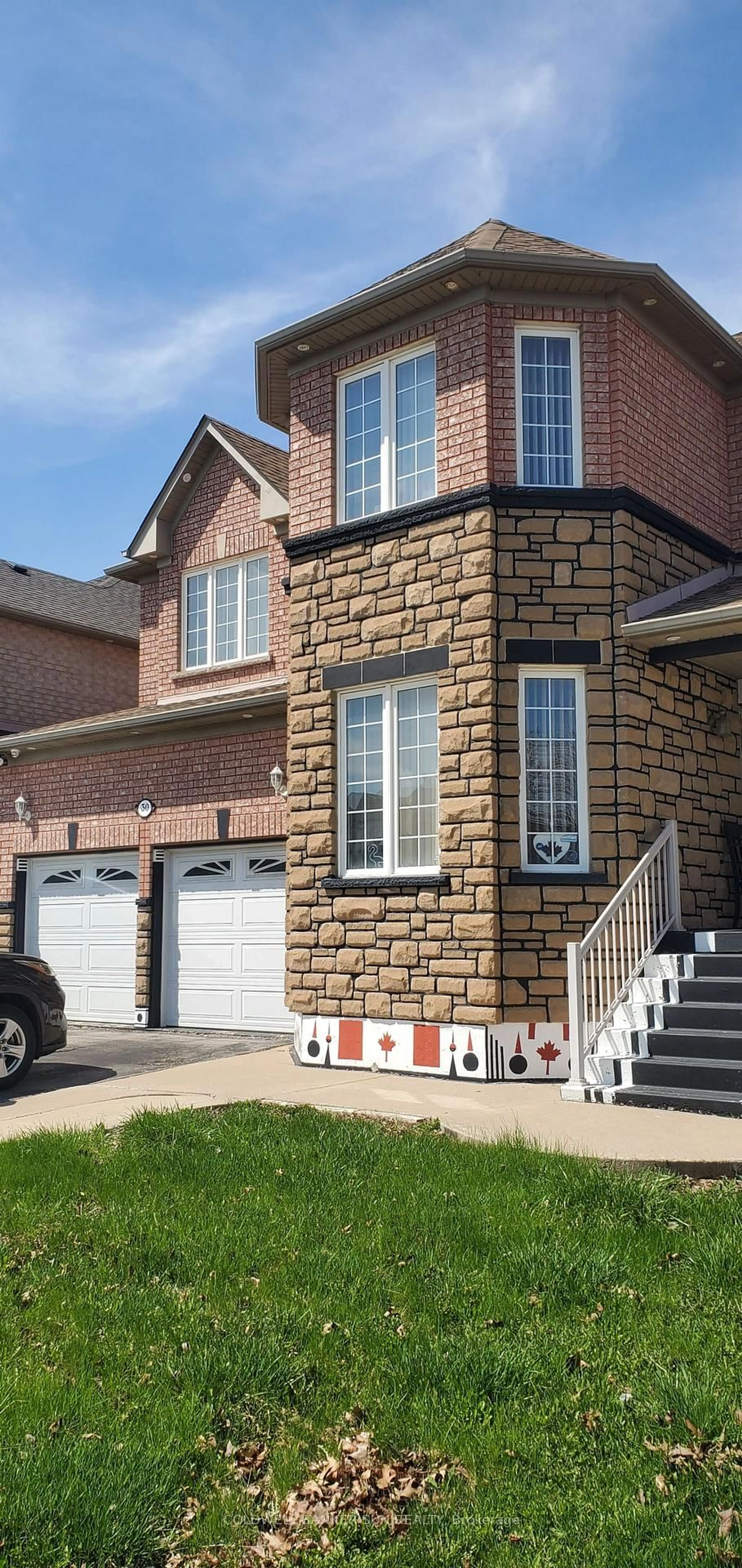 Home with brick exterior material, street for 30 Ice Fields Rd, Brampton Ontario L6R 3G8