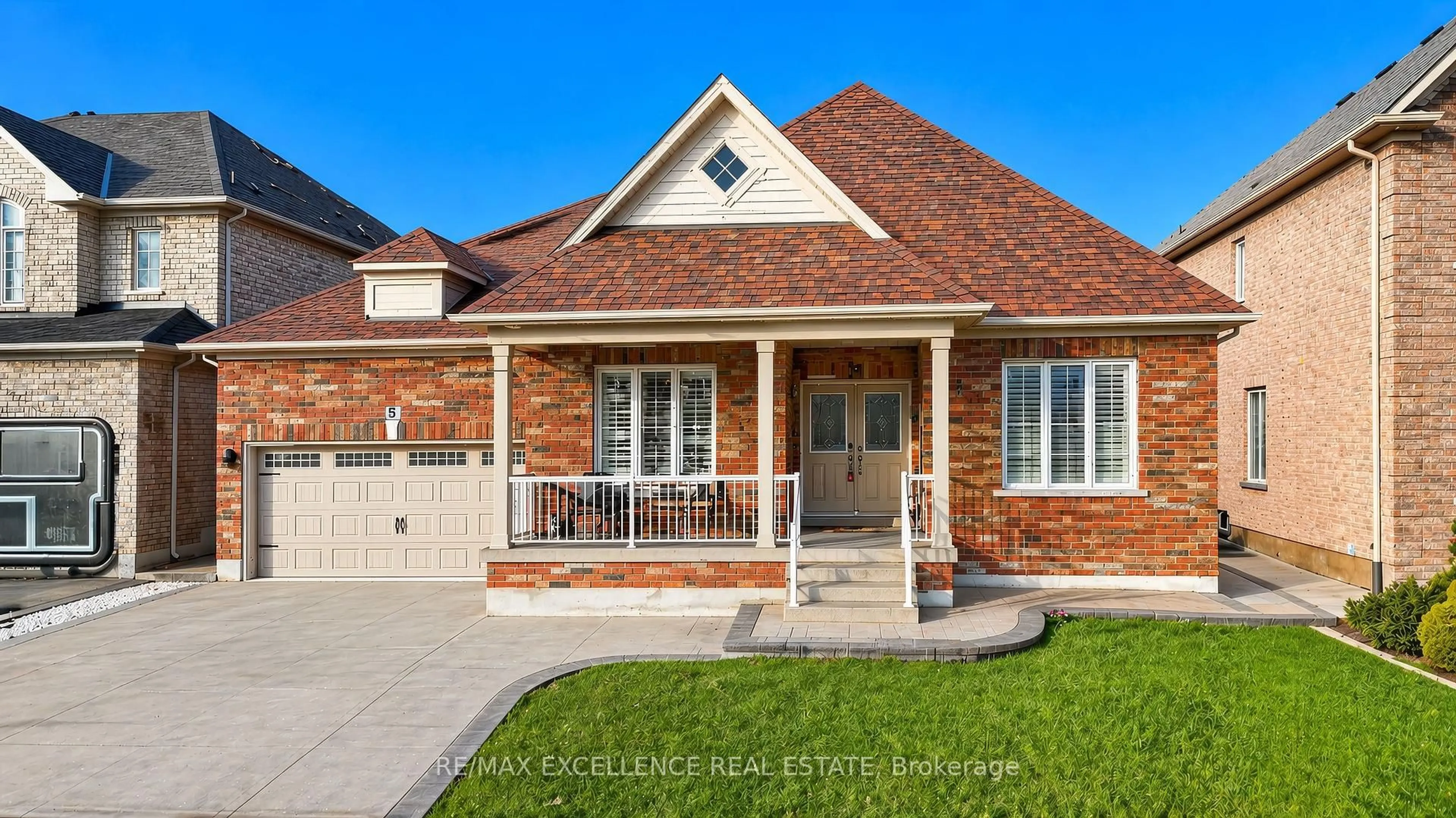 Home with brick exterior material, street for 5 Castlegate Blvd, Brampton Ontario L6P 2L4