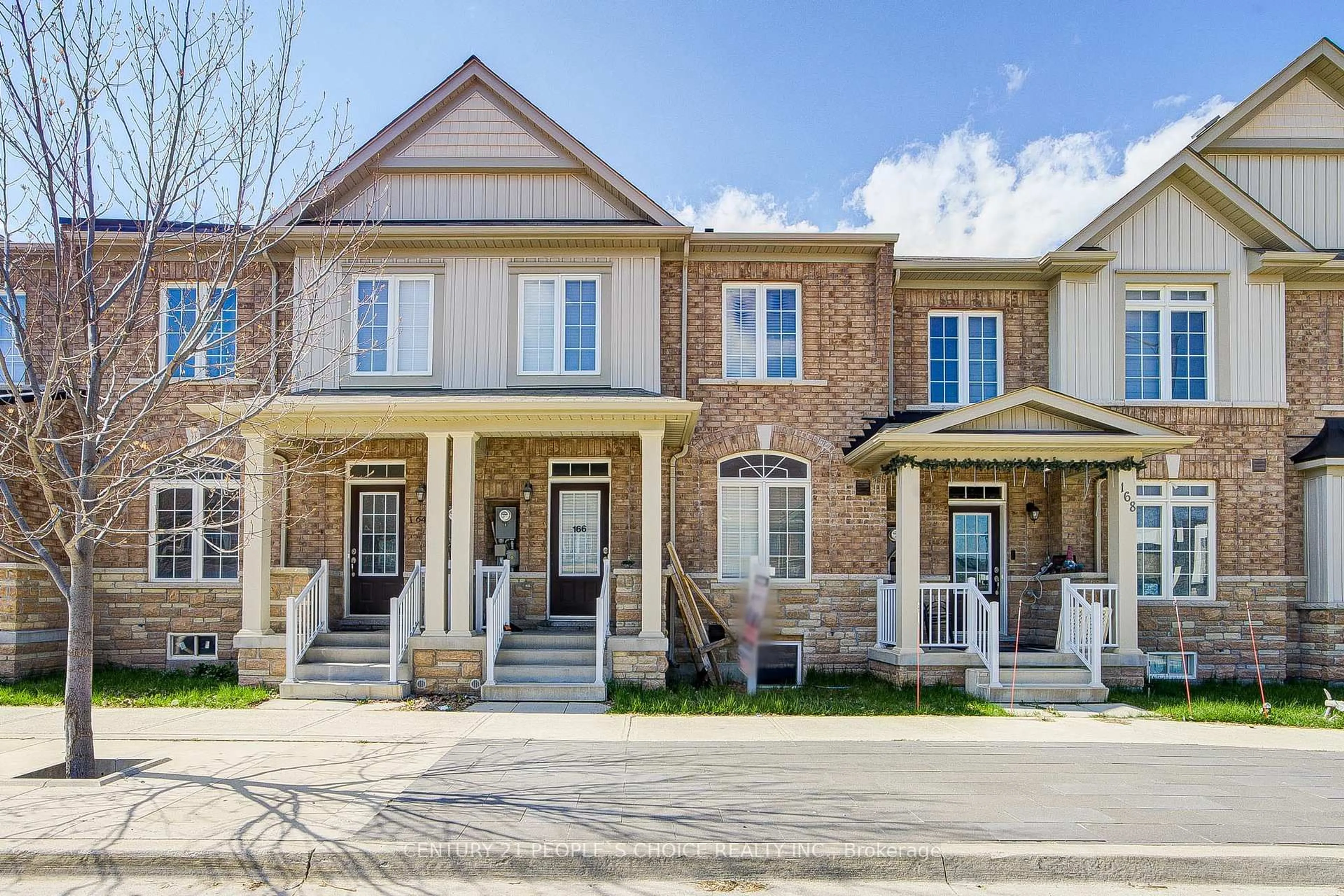 Home with brick exterior material, street for 166 Remembrance Rd, Brampton Ontario L7A 4X1