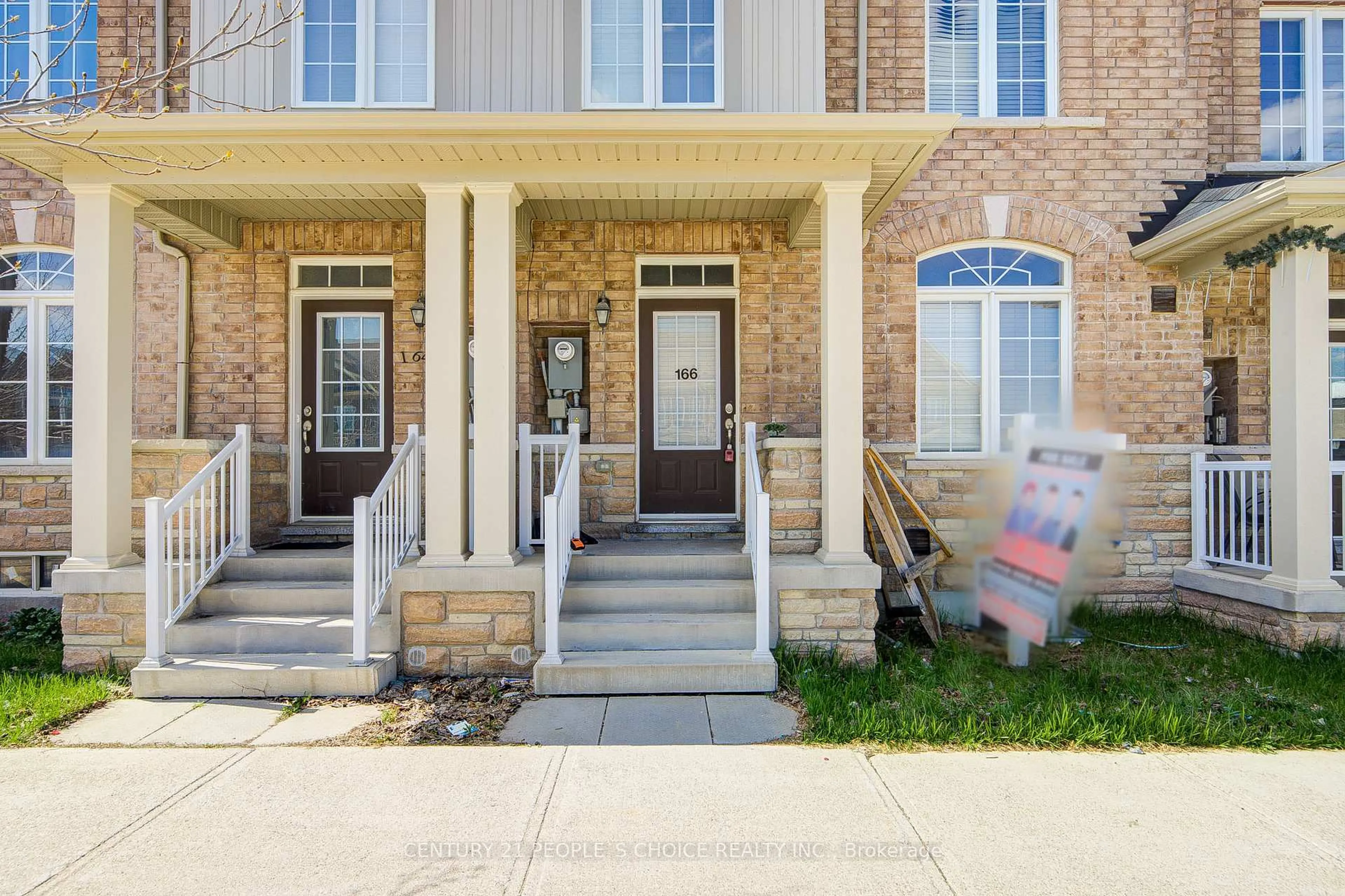 Home with brick exterior material, street for 166 Remembrance Rd, Brampton Ontario L7A 4X1