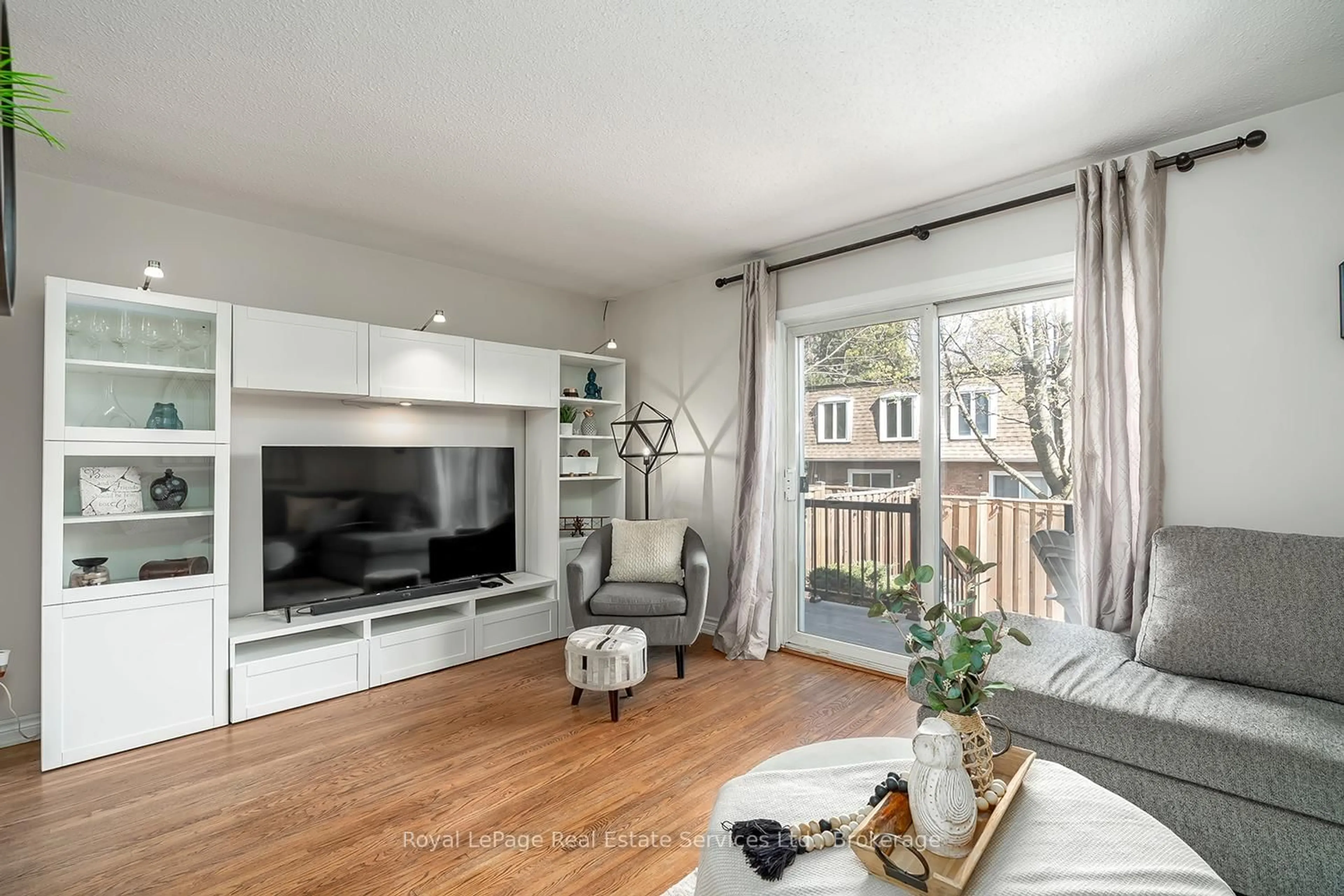 Living room with furniture, wood/laminate floor for 1573 Westminster Pl, Burlington Ontario L7P 2B4