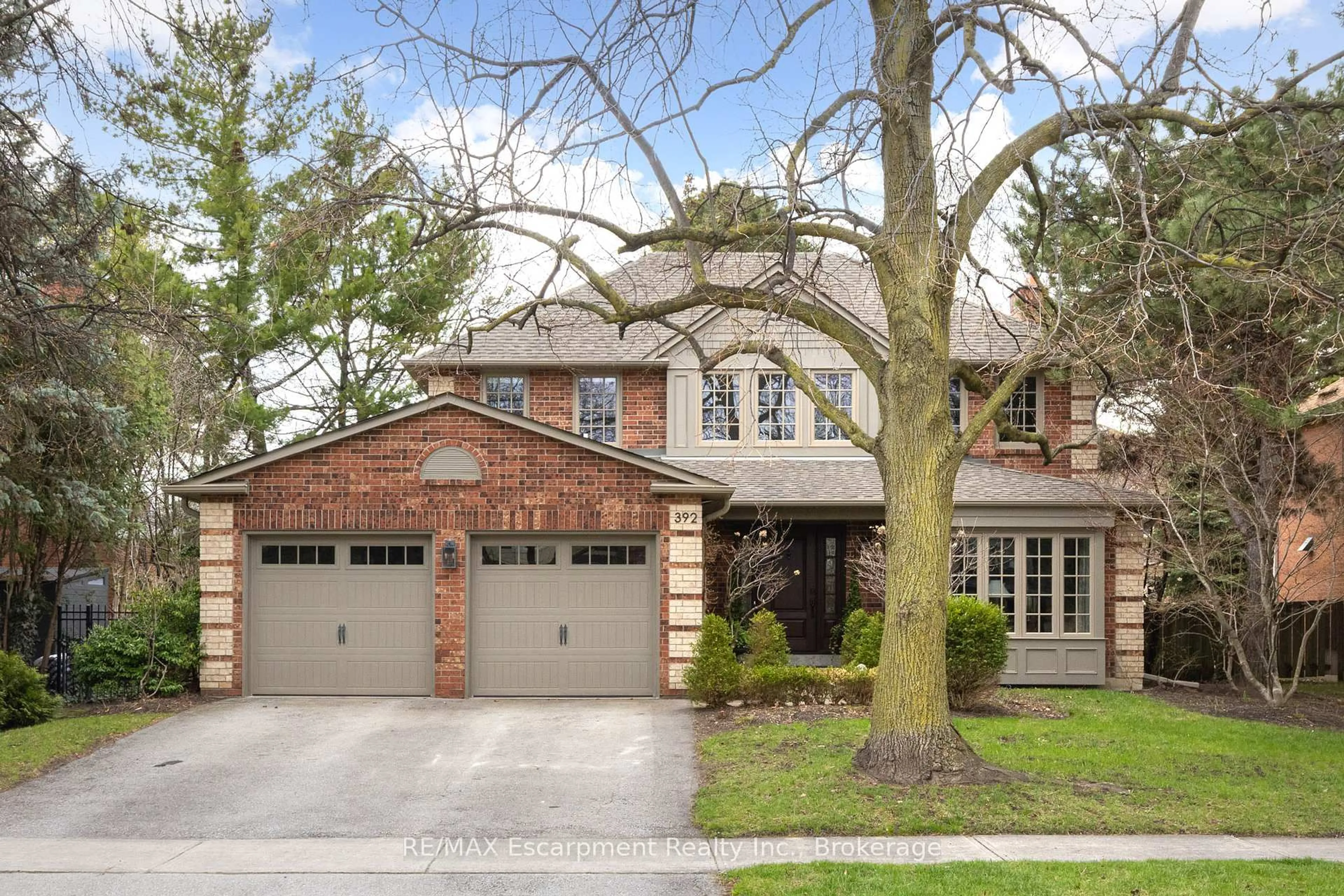 Home with brick exterior material, street for 392 Aspen Forest Dr, Oakville Ontario L6J 6H5