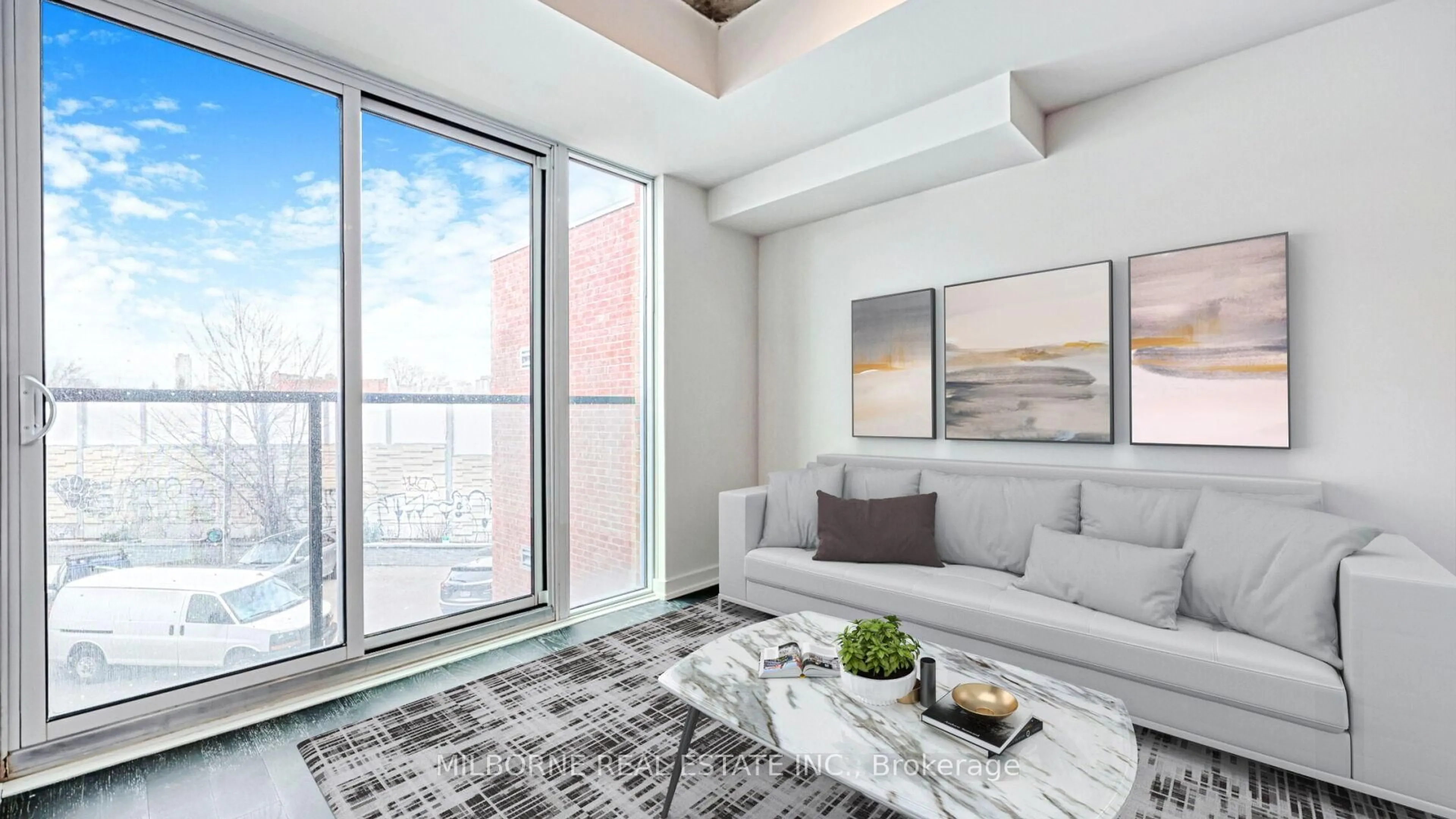 Living room with furniture, unknown for 57 Brock Ave #210, Toronto Ontario M3H 3N2