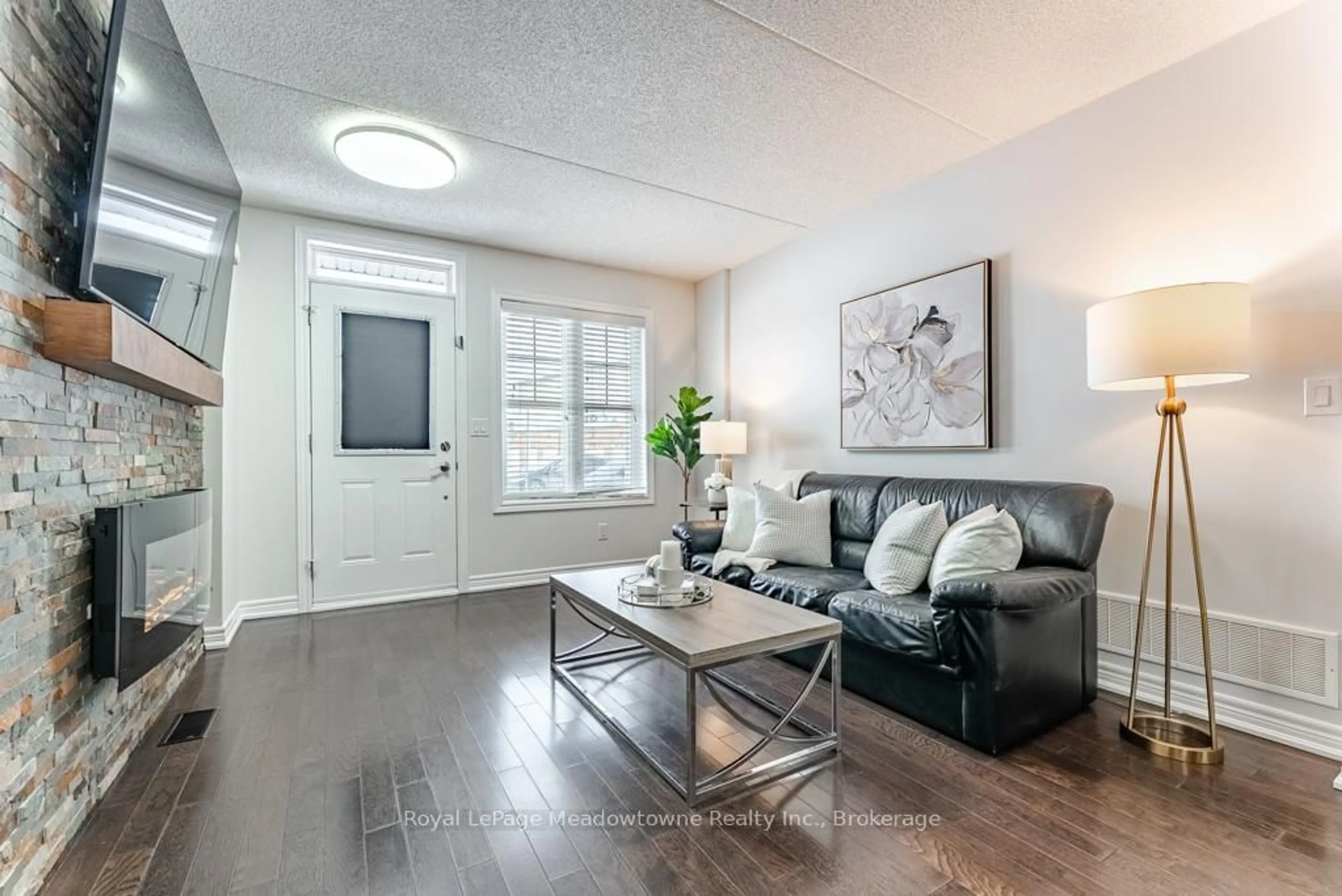 Living room with furniture, unknown for 1380 Costigan Rd #77, Milton Ontario L9T 8L2