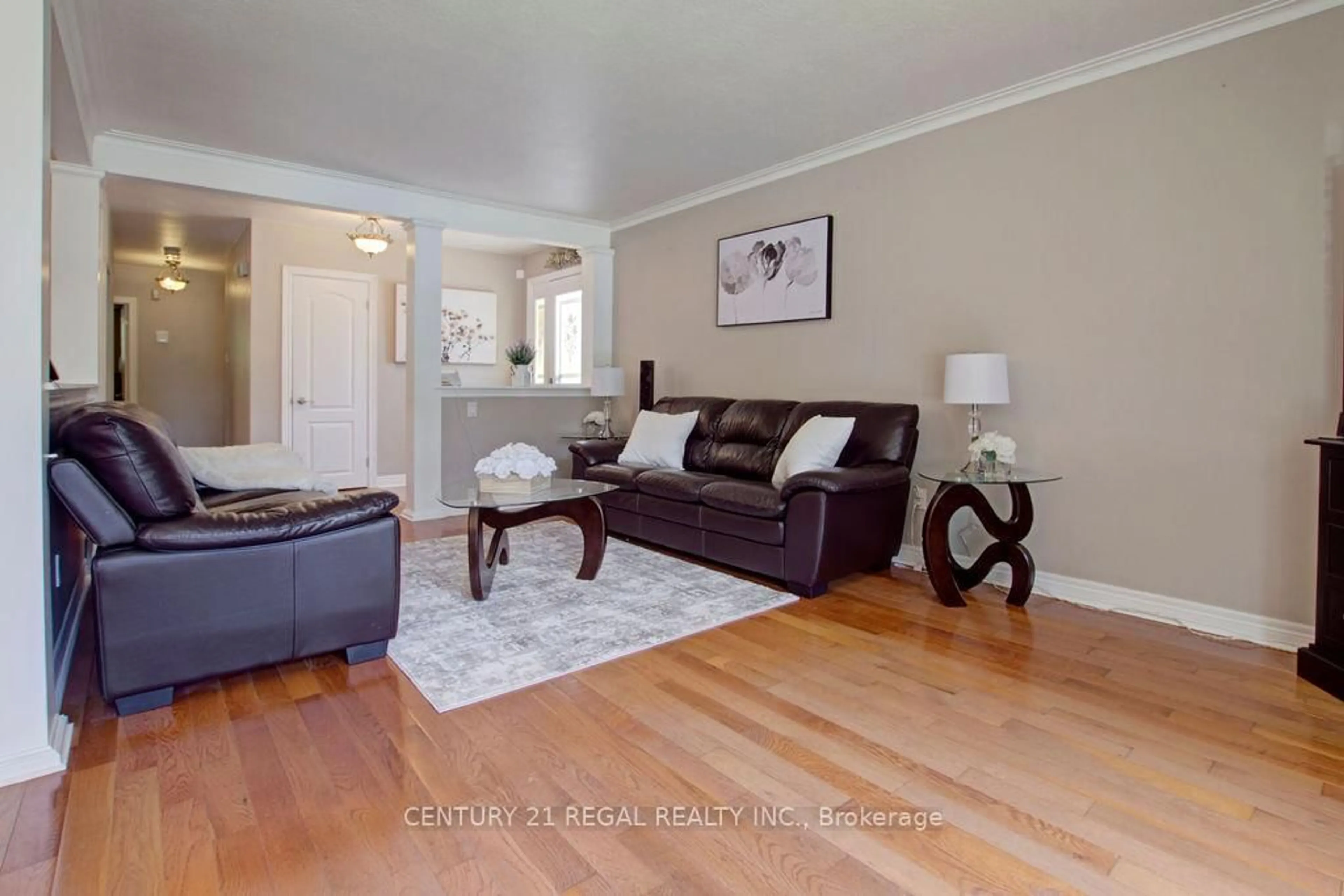 Living room with furniture, wood/laminate floor for 14 Thorpe Rd, Toronto Ontario M9R 2C2