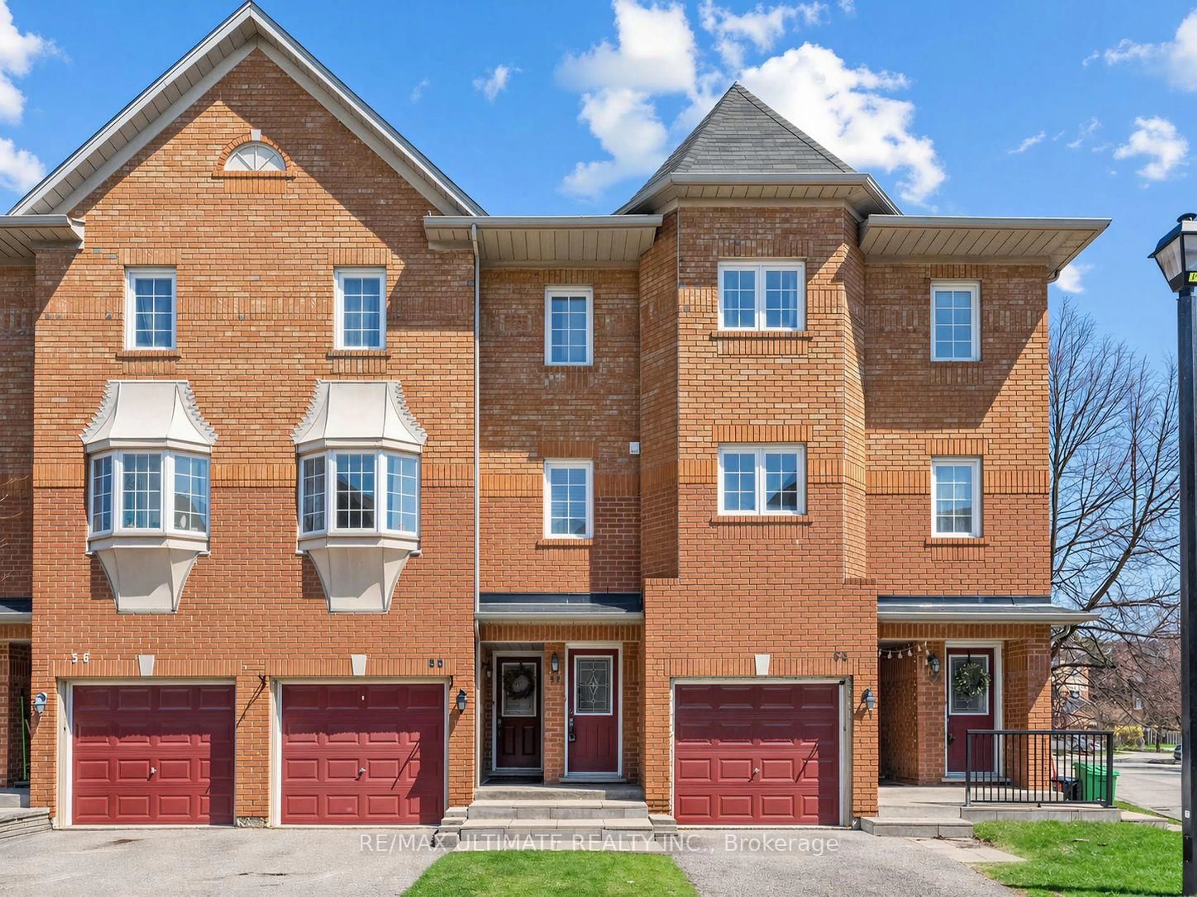 Home with brick exterior material, street for 6950 Tenth Line #54, Mississauga Ontario L5N 6Y1