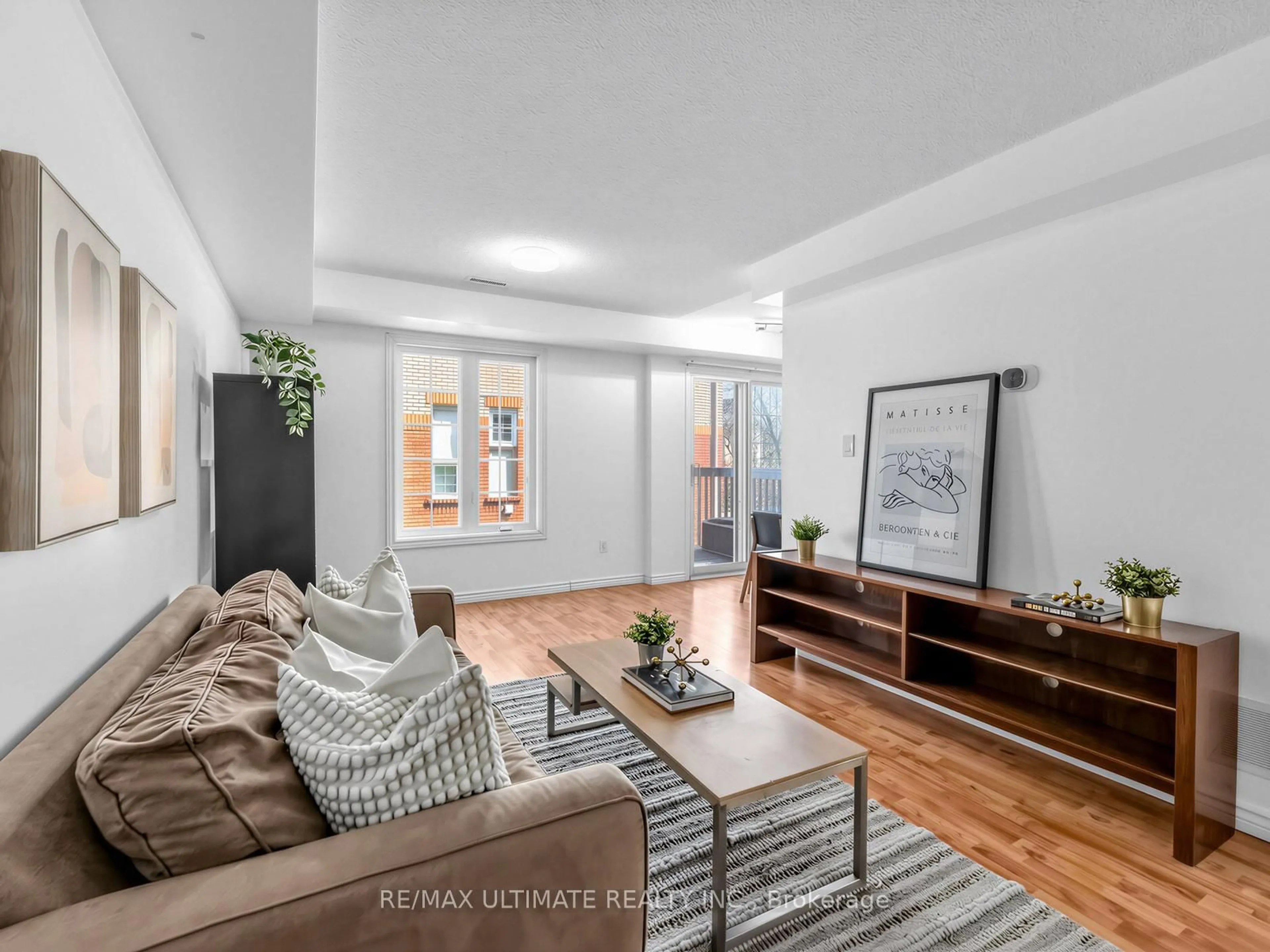 Living room with furniture, unknown for 6950 Tenth Line #54, Mississauga Ontario L5N 6Y1