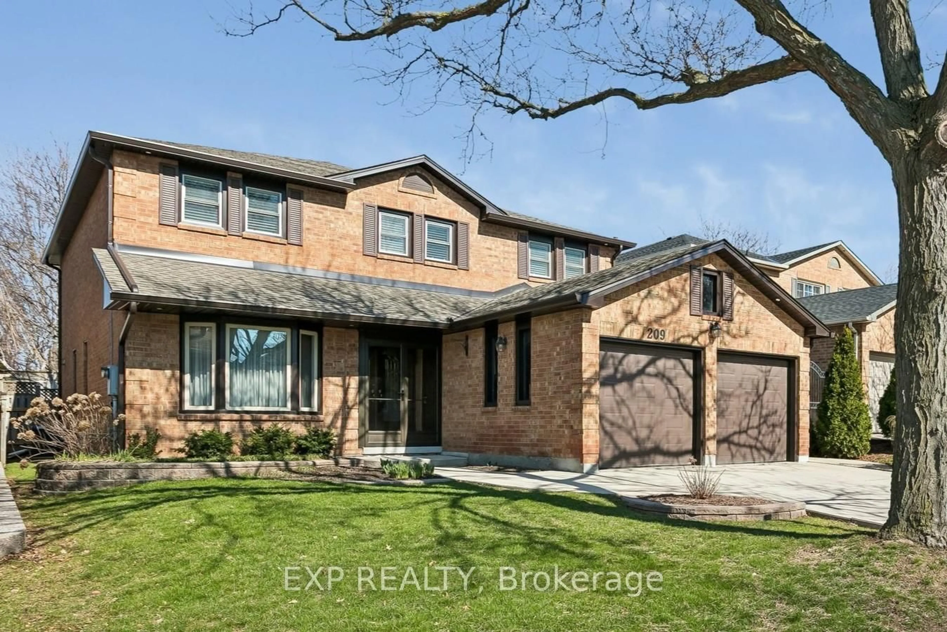 Home with brick exterior material, street for 209 Nottingham Dr, Oakville Ontario L6H 4H7