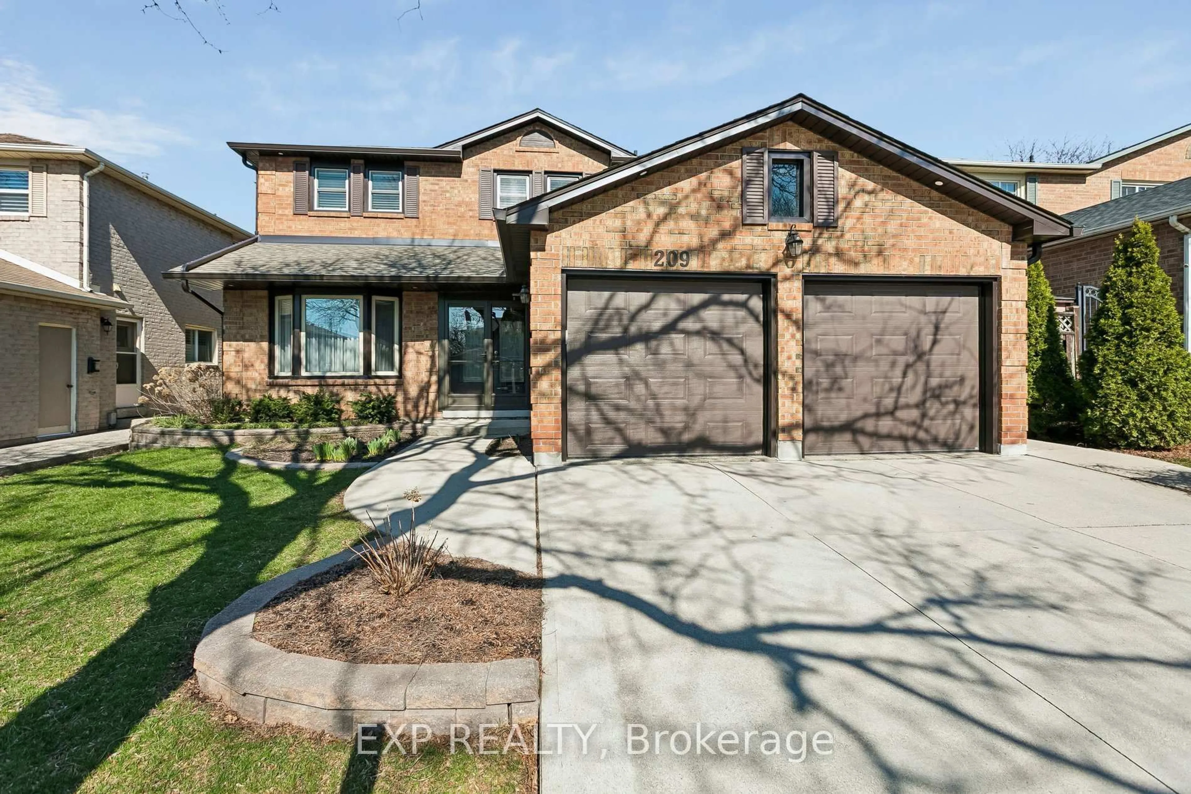 Home with brick exterior material, street for 209 Nottingham Dr, Oakville Ontario L6H 4H7