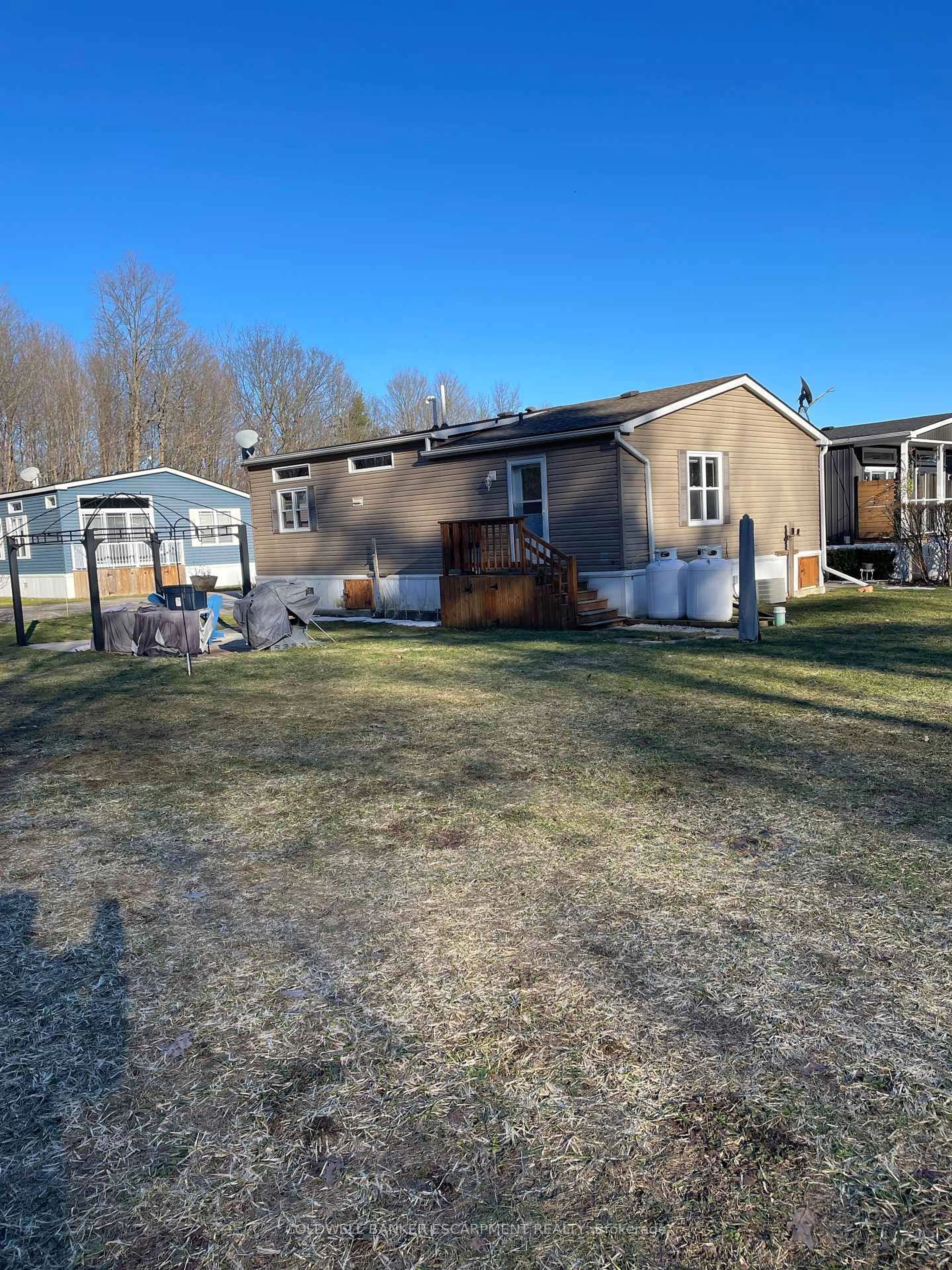 A pic from outside/outdoor area/front of a property/back of a property/a pic from drone, unknown for 4449 Milburough Line #19 Cedar St., Burlington Ontario L7P 0C5