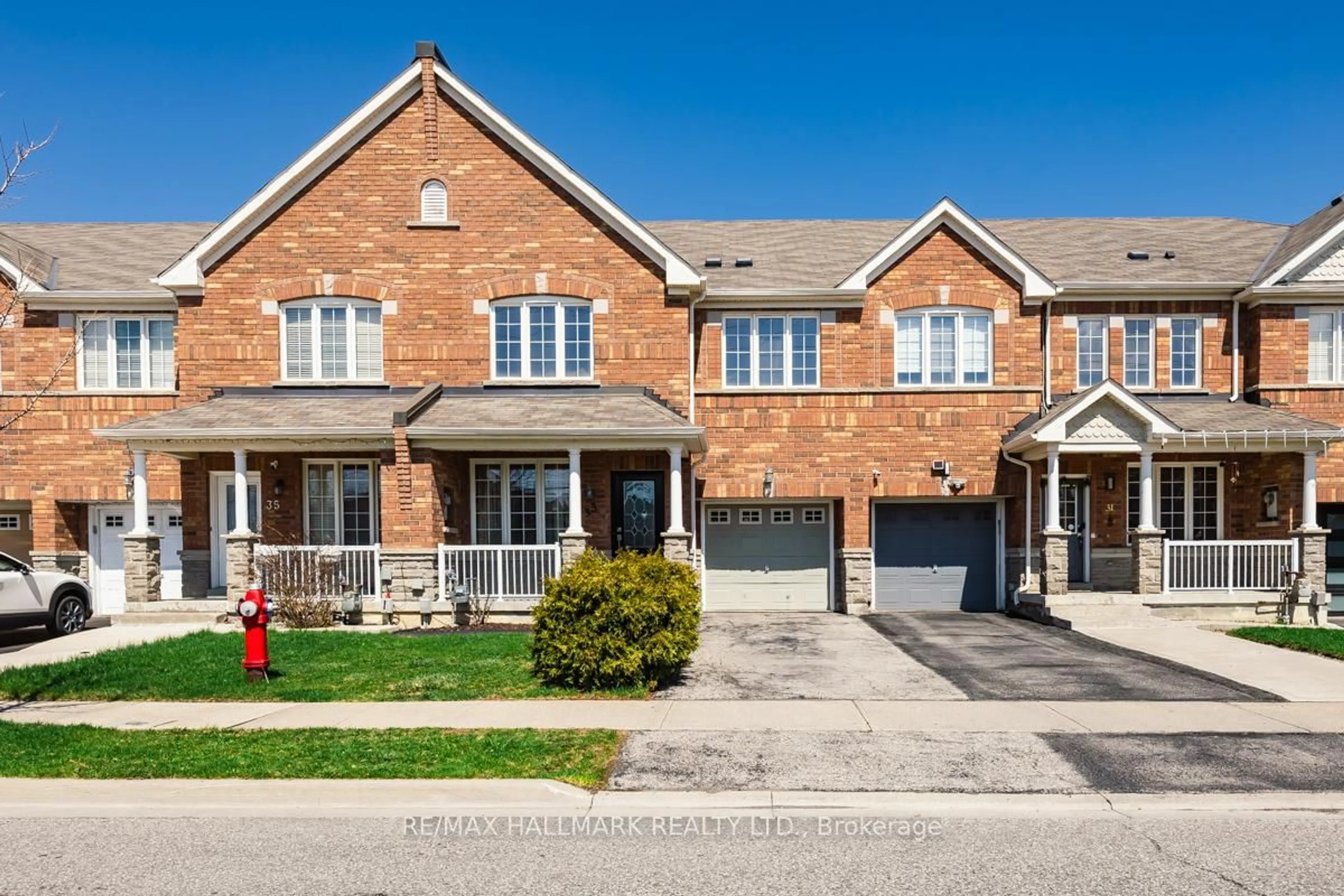 Home with brick exterior material, street for 33 Tomabrook Cres, Brampton Ontario L6R 0V2