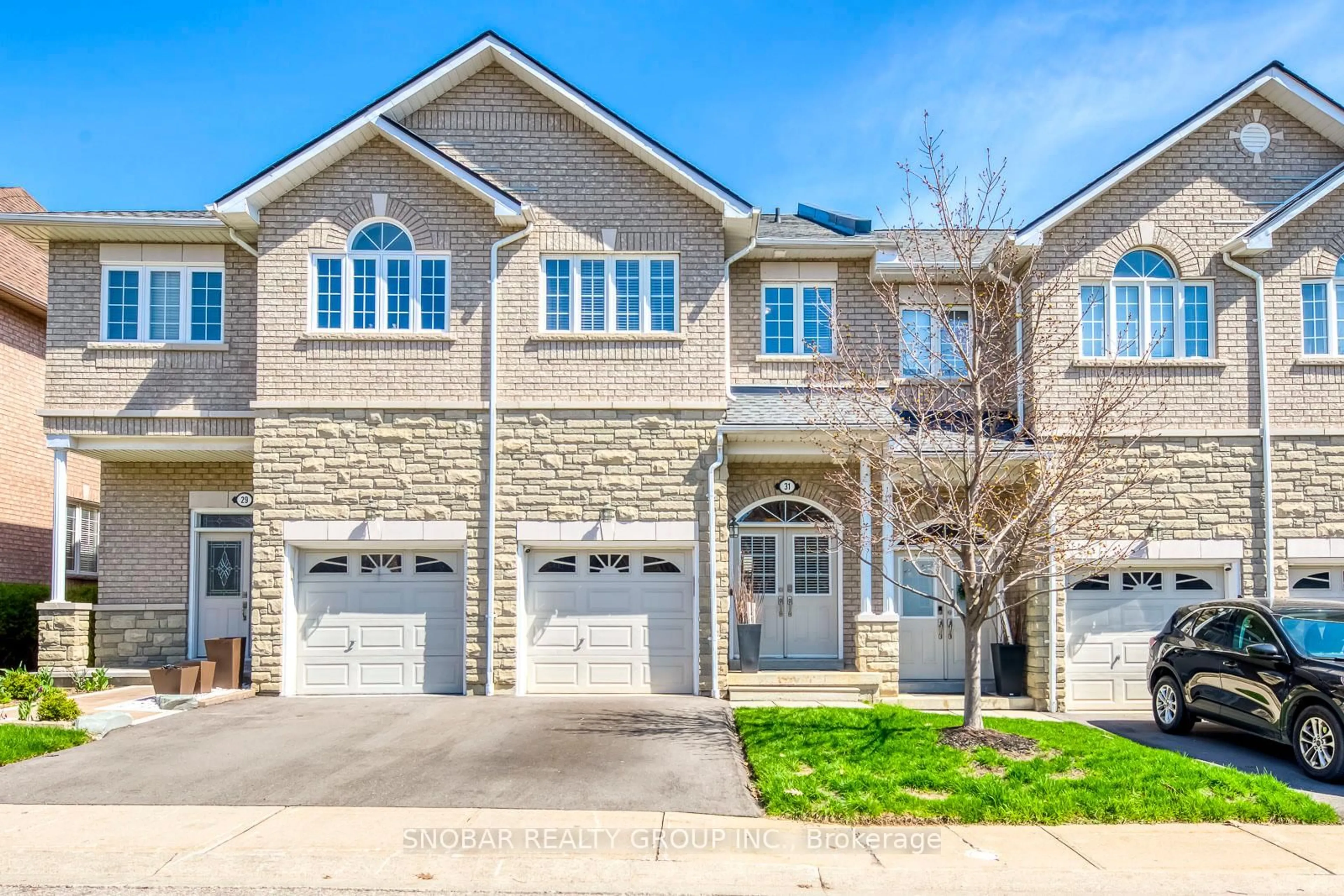 Home with brick exterior material, street for 470 Faith Dr #31, Mississauga Ontario L5R 4E8