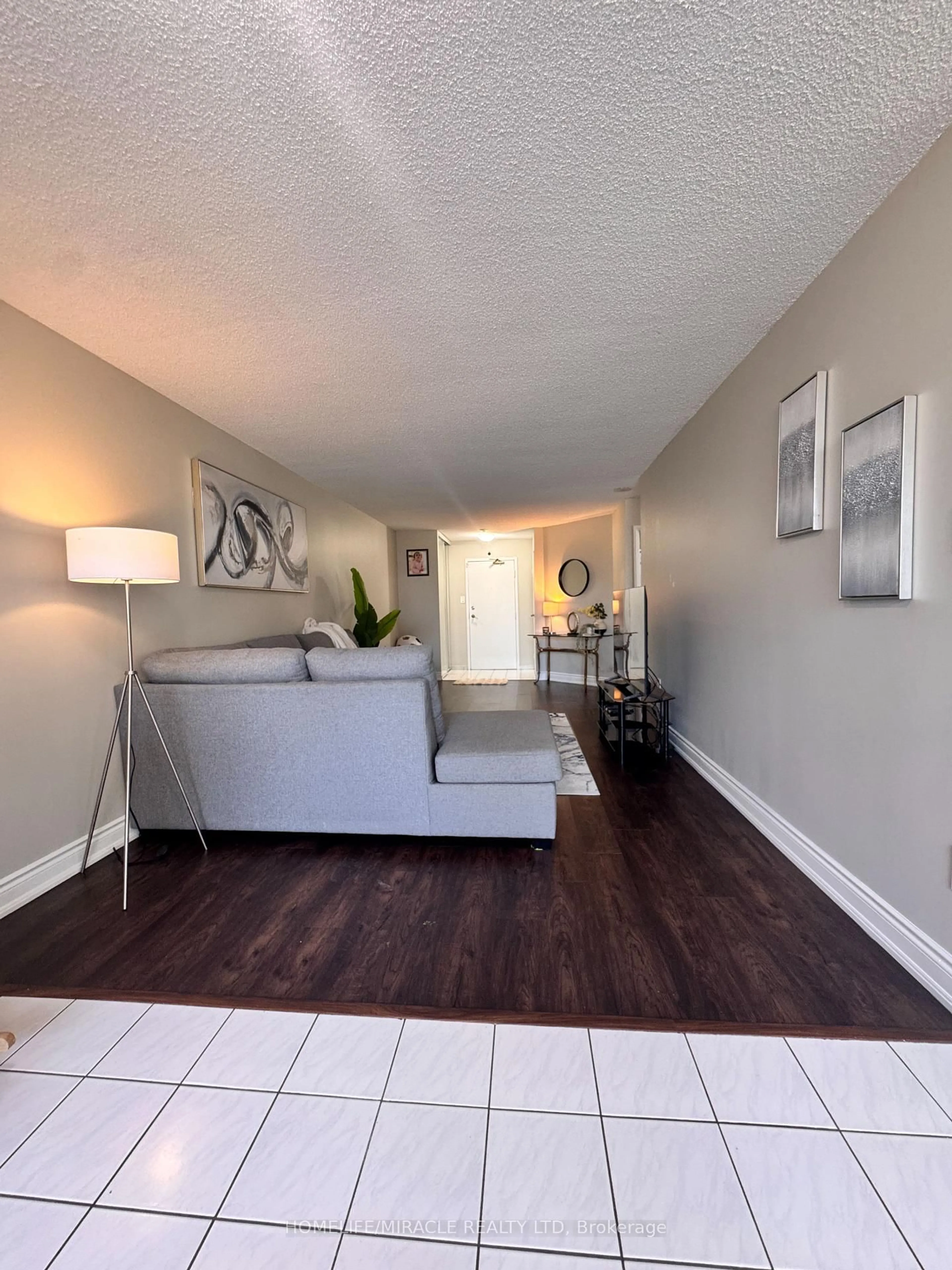 Living room with furniture, unknown for 1 Rowntree Rd #214, Toronto Ontario M9V 5G7