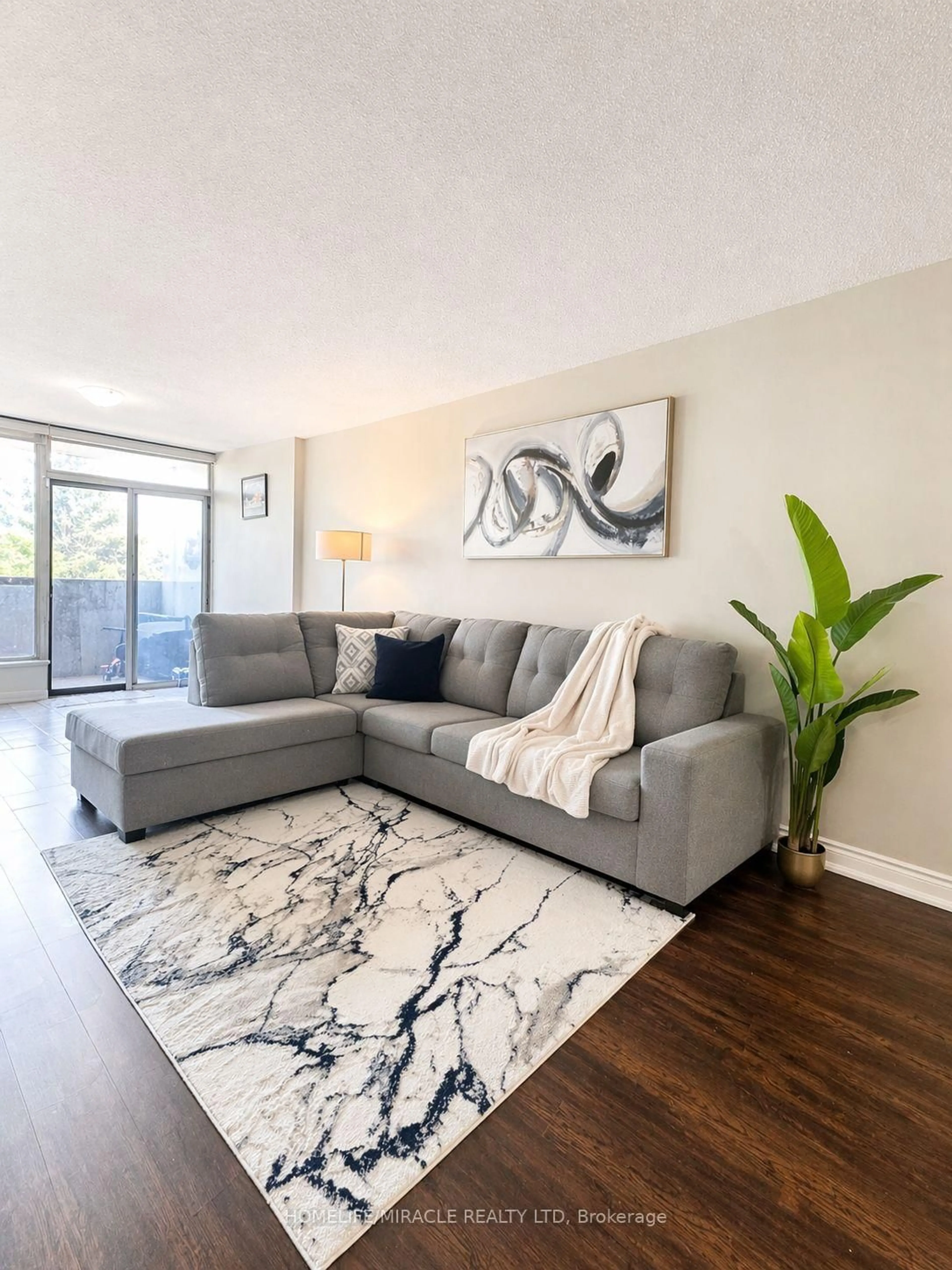 Living room with furniture, unknown for 1 Rowntree Rd #214, Toronto Ontario M9V 5G7