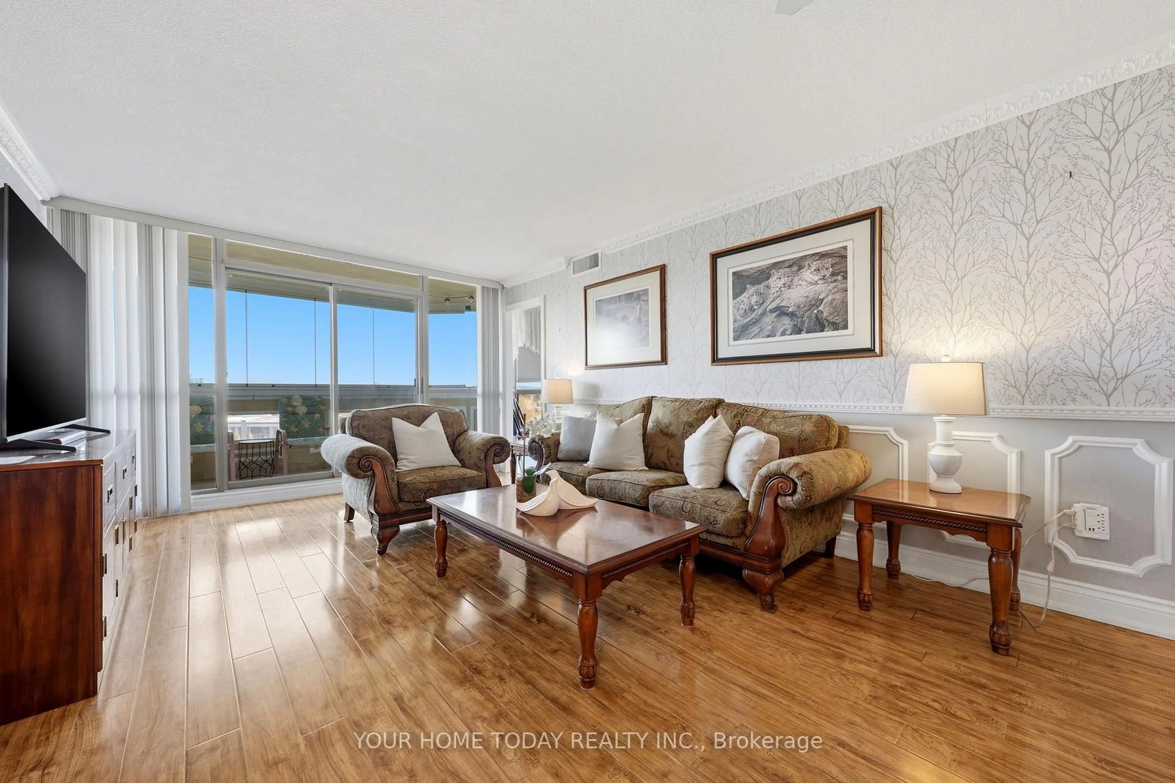 Living room with furniture, wood/laminate floor for 20 McFarlane Dr #507, Halton Hills Ontario L7G 5J8