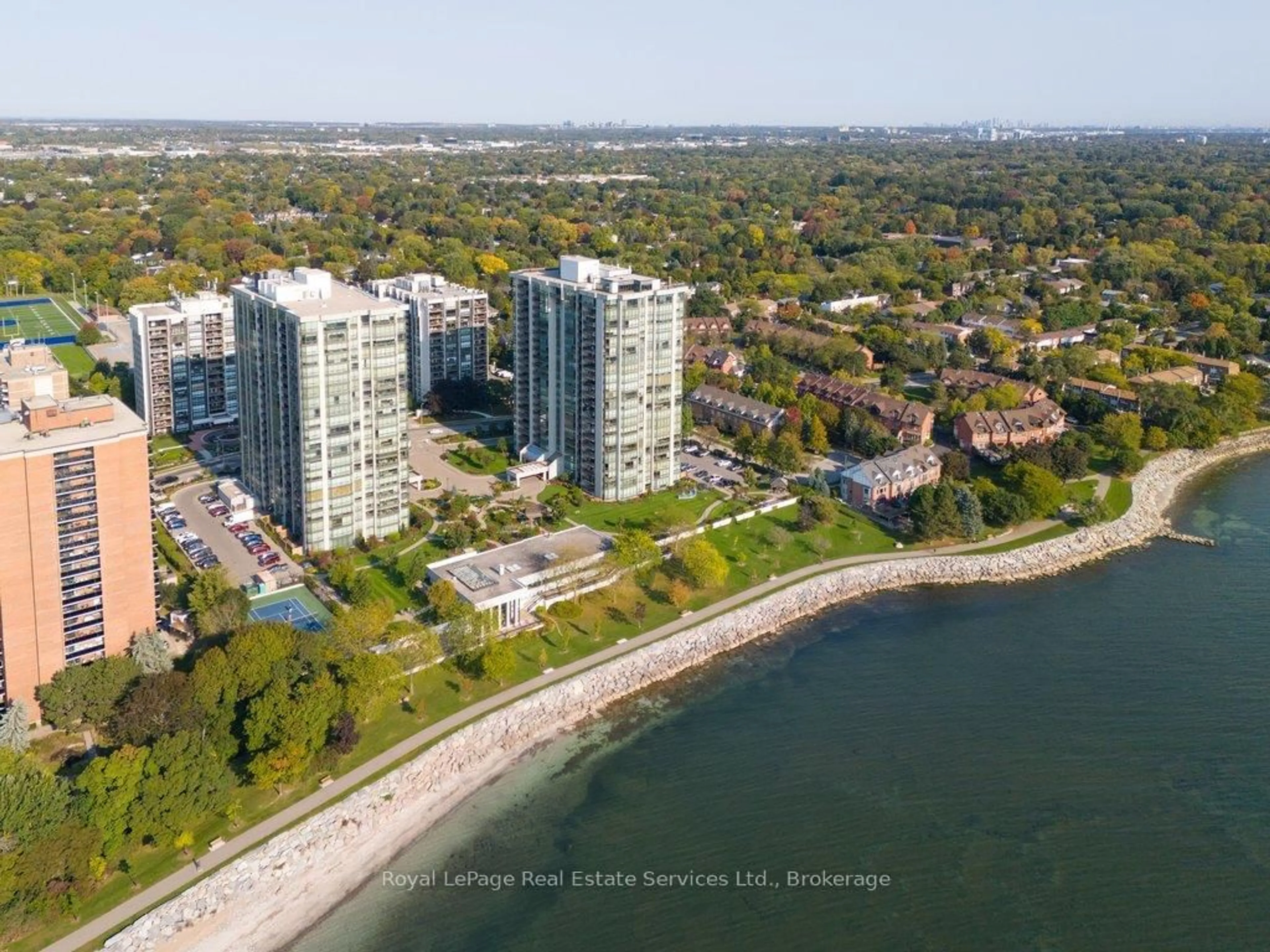 A pic from outside/outdoor area/front of a property/back of a property/a pic from drone, water/lake/river/ocean view for 2180 Marine Dr #208, Oakville Ontario L6L 5V2