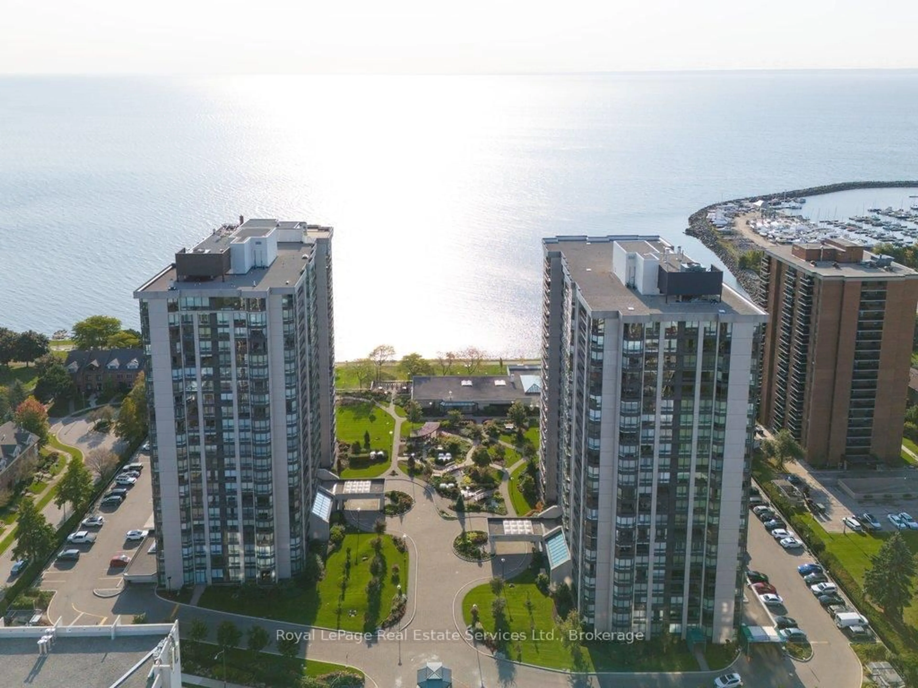 A pic from outside/outdoor area/front of a property/back of a property/a pic from drone, city buildings view from balcony for 2180 Marine Dr #208, Oakville Ontario L6L 5V2