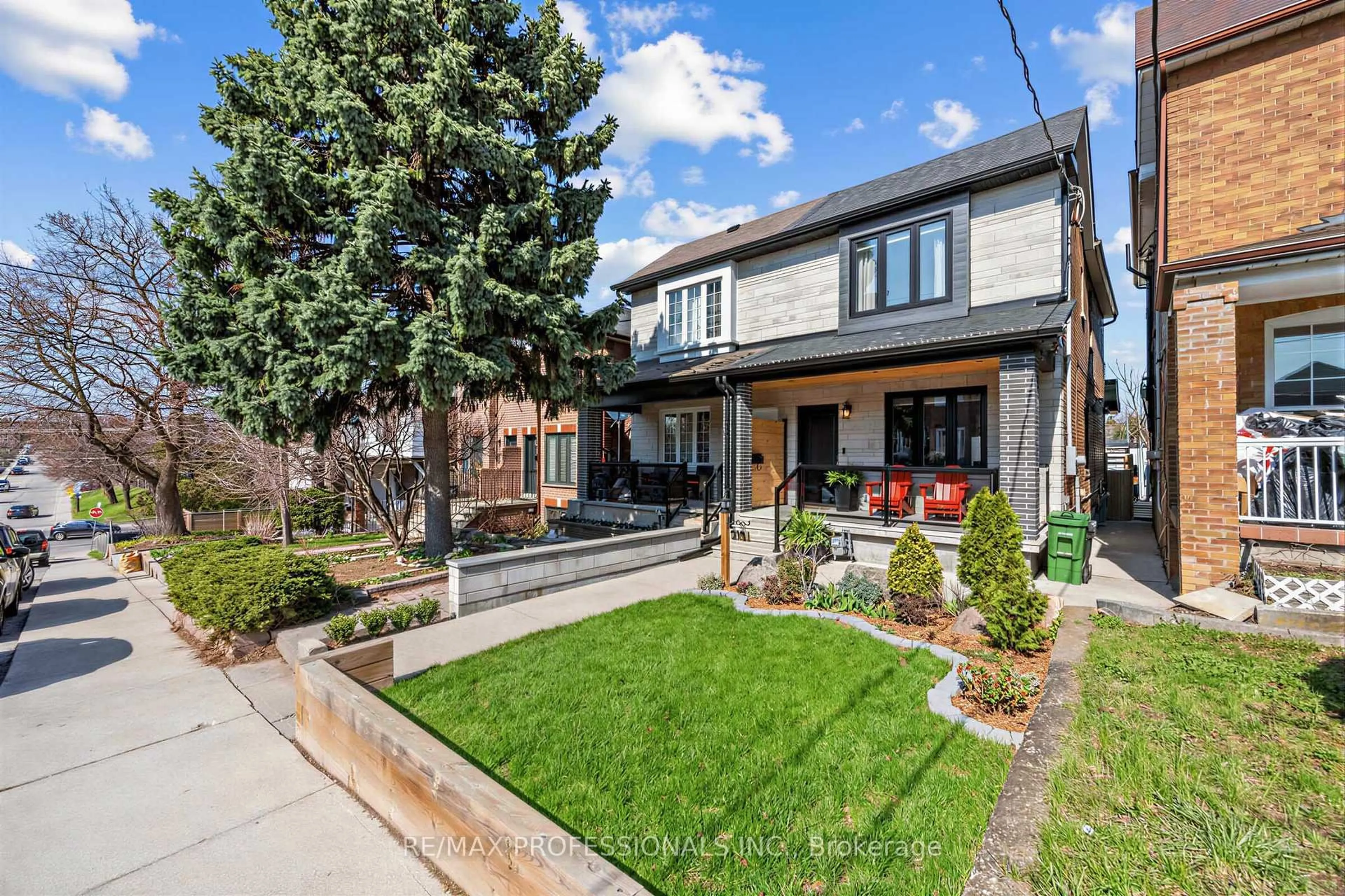 Home with brick exterior material, street for 215 Gilbert Ave, Toronto Ontario M6E 4W6