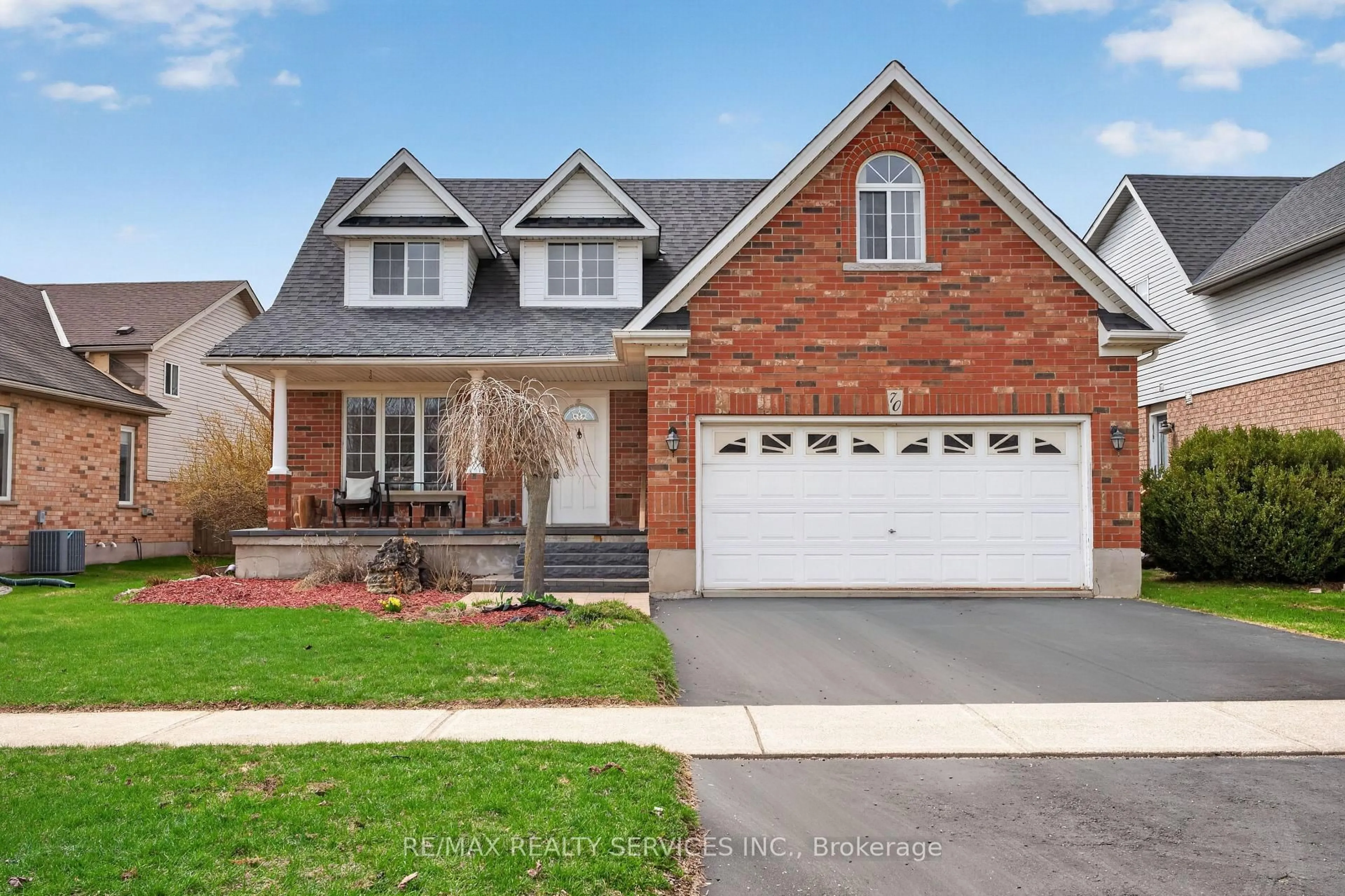 Home with brick exterior material, street for 70 Hunter Rd, Orangeville Ontario L9W 5C5