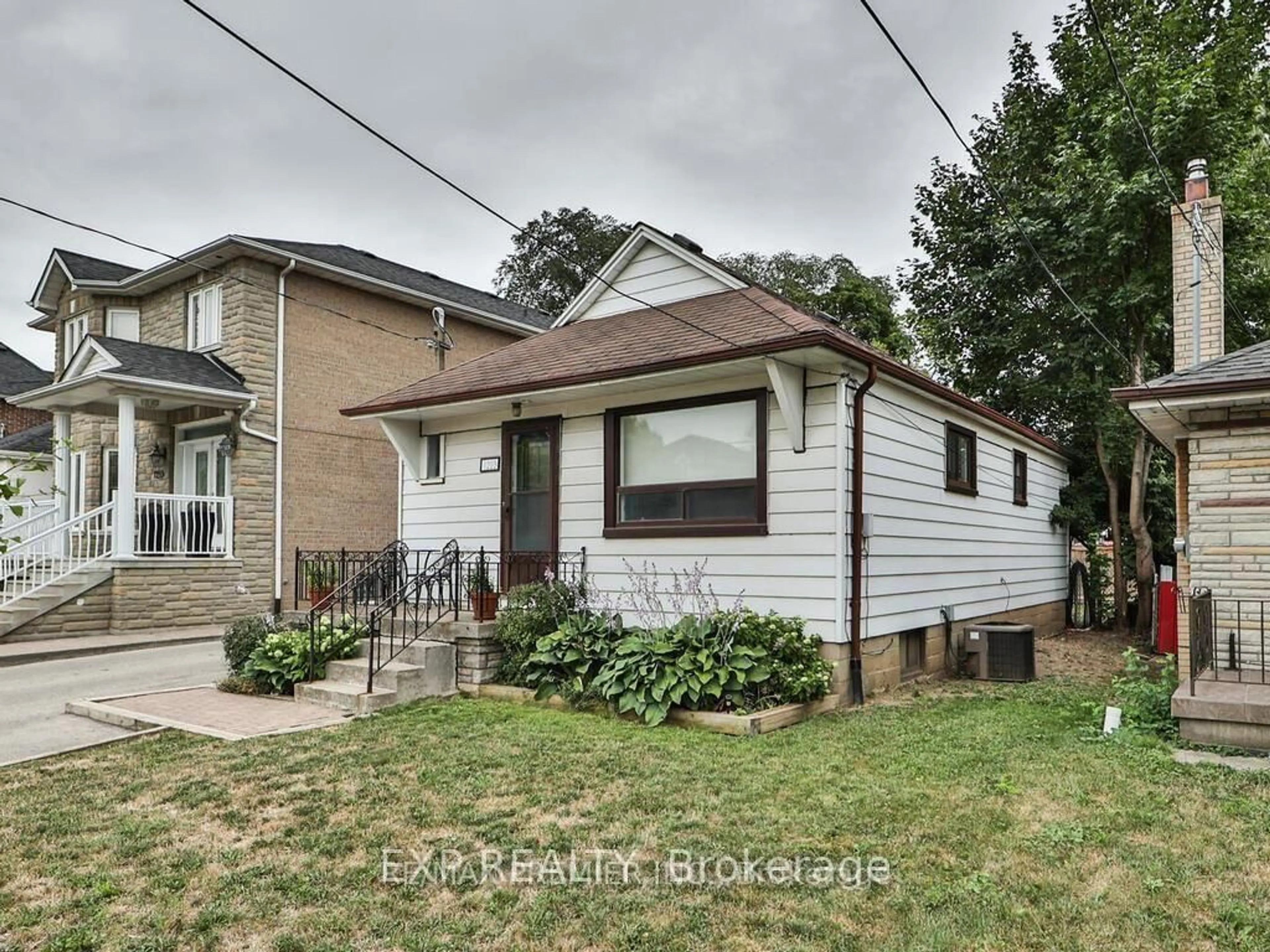 Home with brick exterior material, street for 1223 Glencairn Ave, Toronto Ontario M6B 2B6