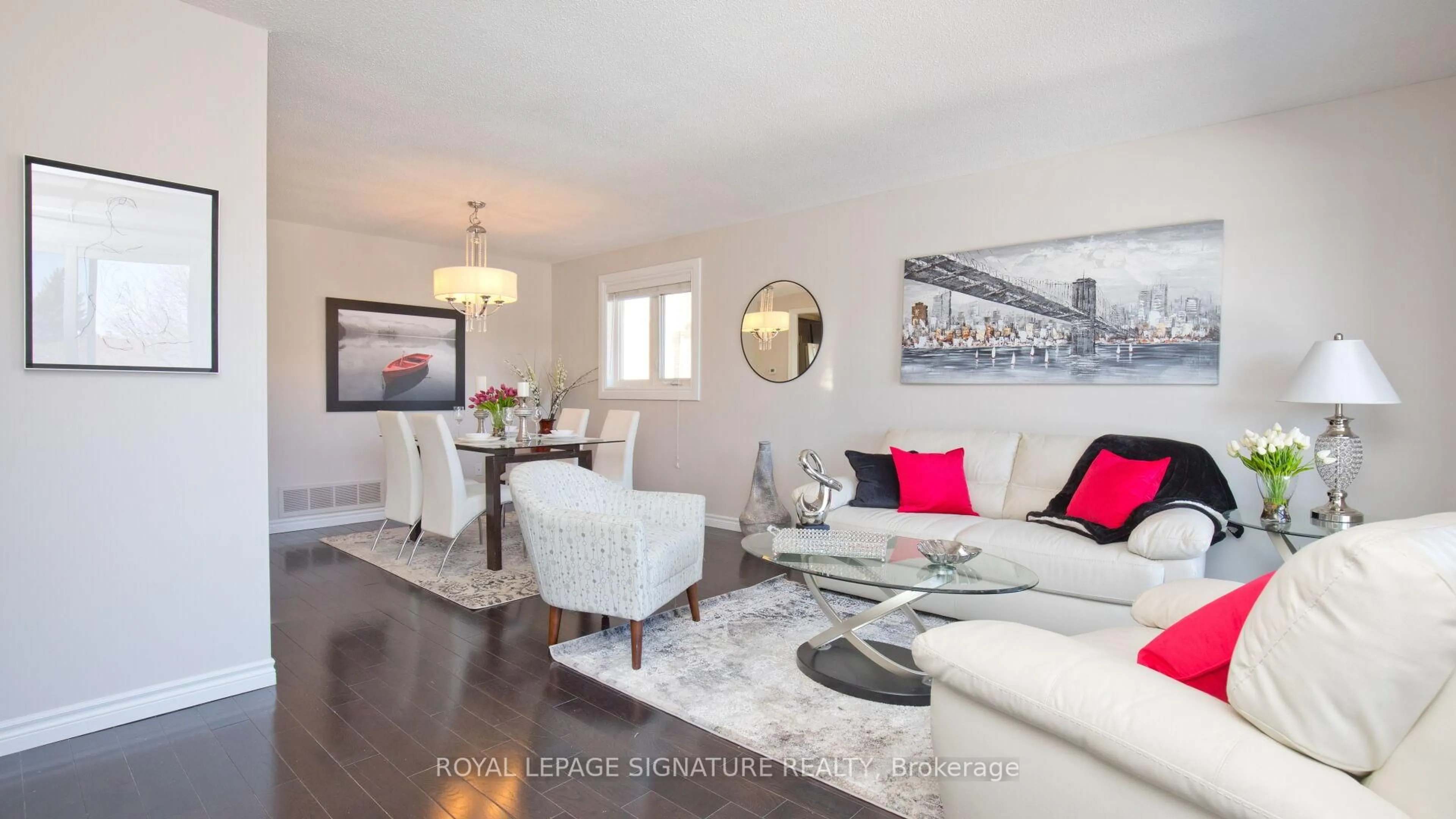 Living room with furniture, wood/laminate floor for 38 Panorama Cres, Brampton Ontario L6S 3T9