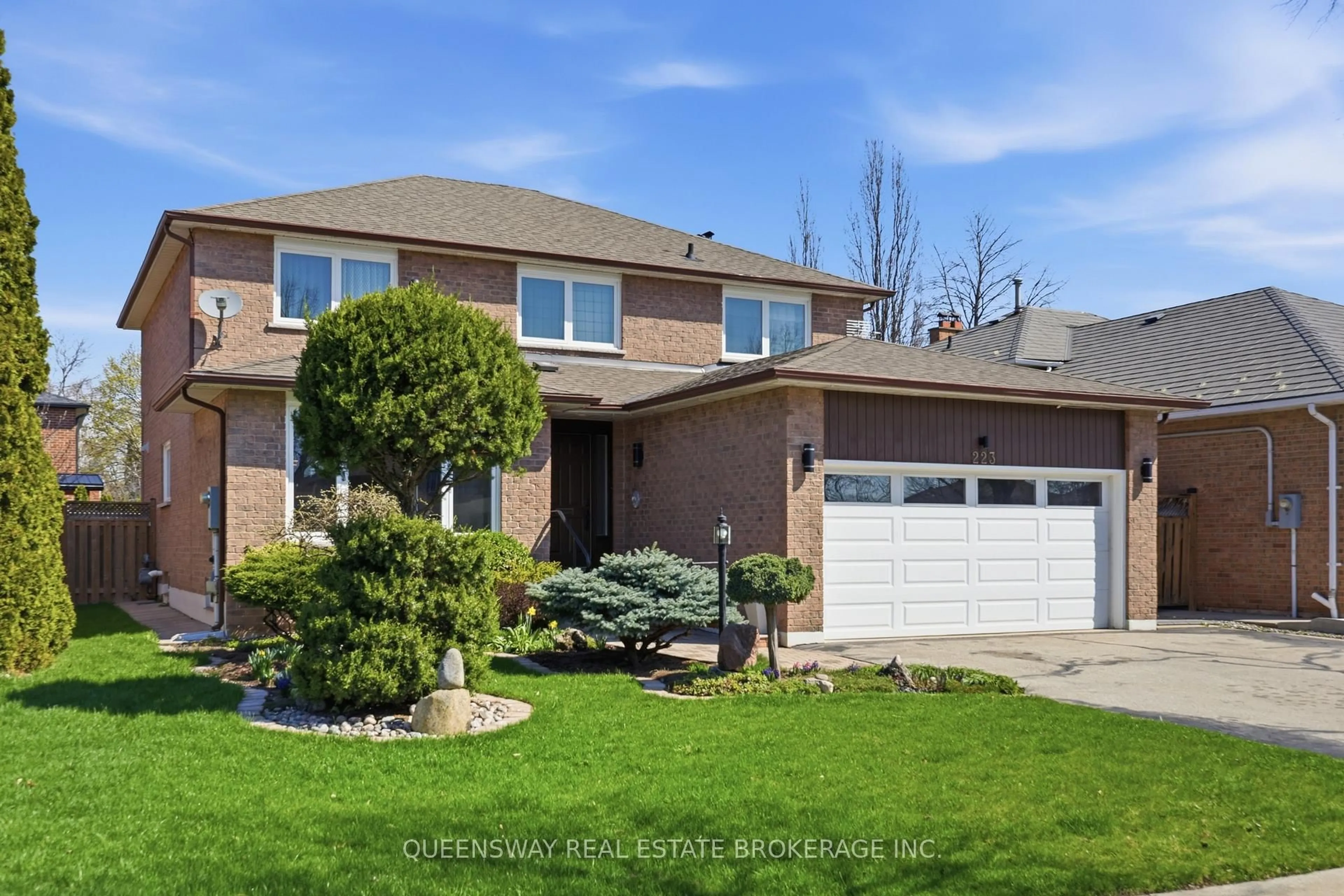 Home with brick exterior material, street for 223 River Oaks Blvd, Oakville Ontario L6H 3V2