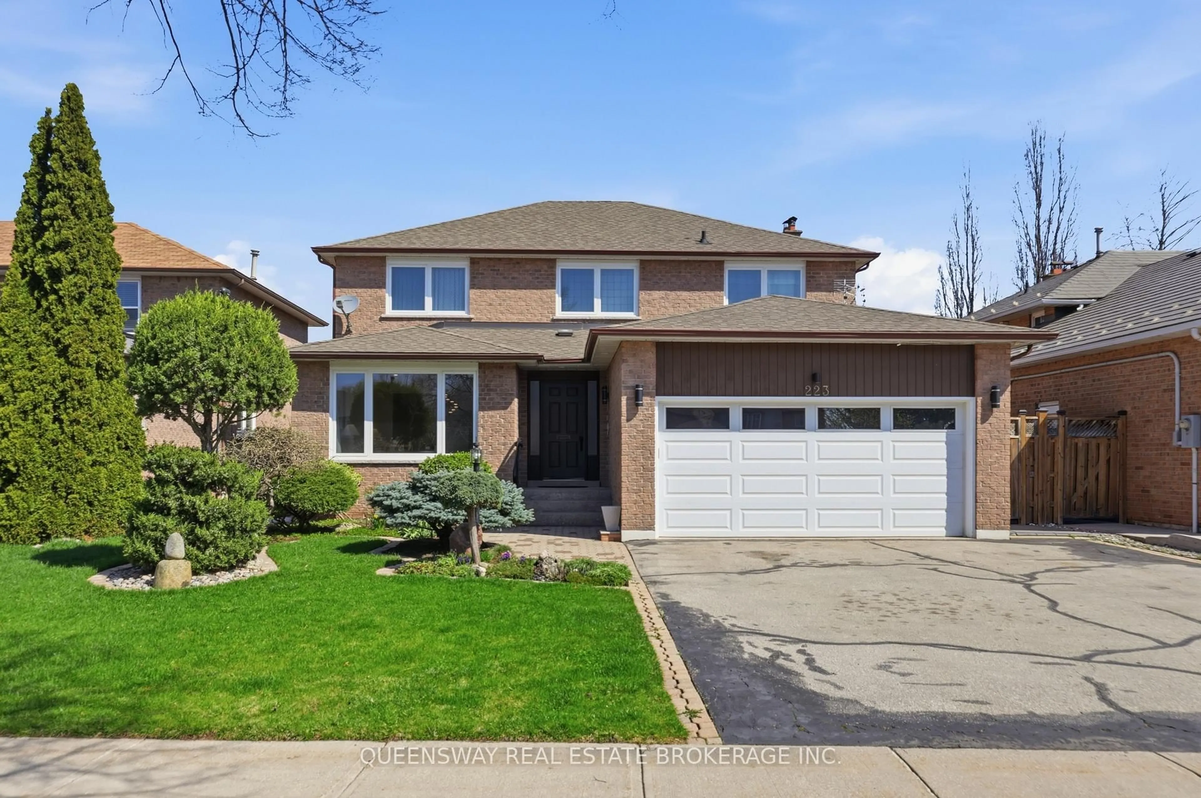 Home with brick exterior material, street for 223 River Oaks Blvd, Oakville Ontario L6H 3V2