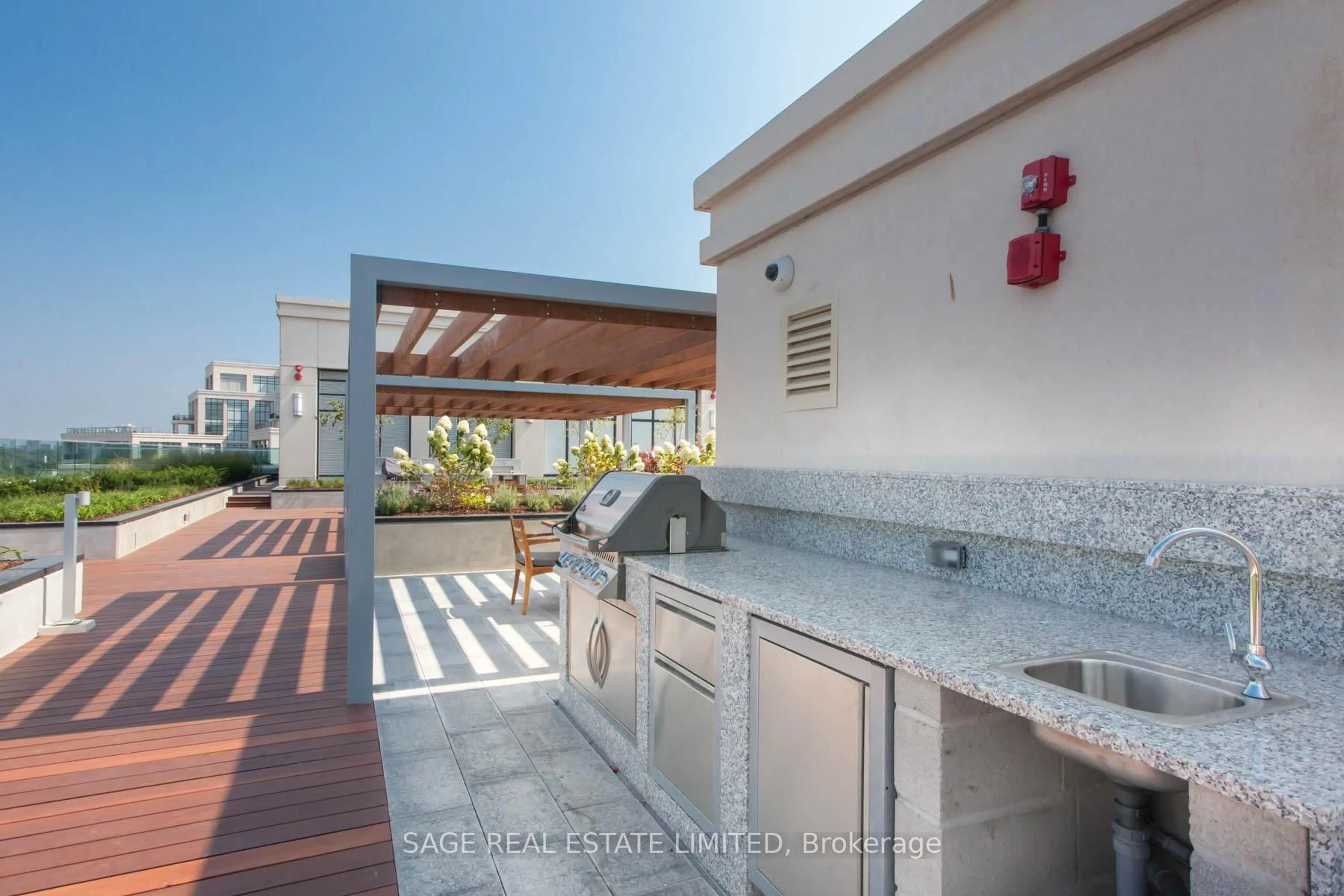 Patio, city buildings view from balcony for 2 Old Mill Dr #504, Toronto Ontario M6S 0A2