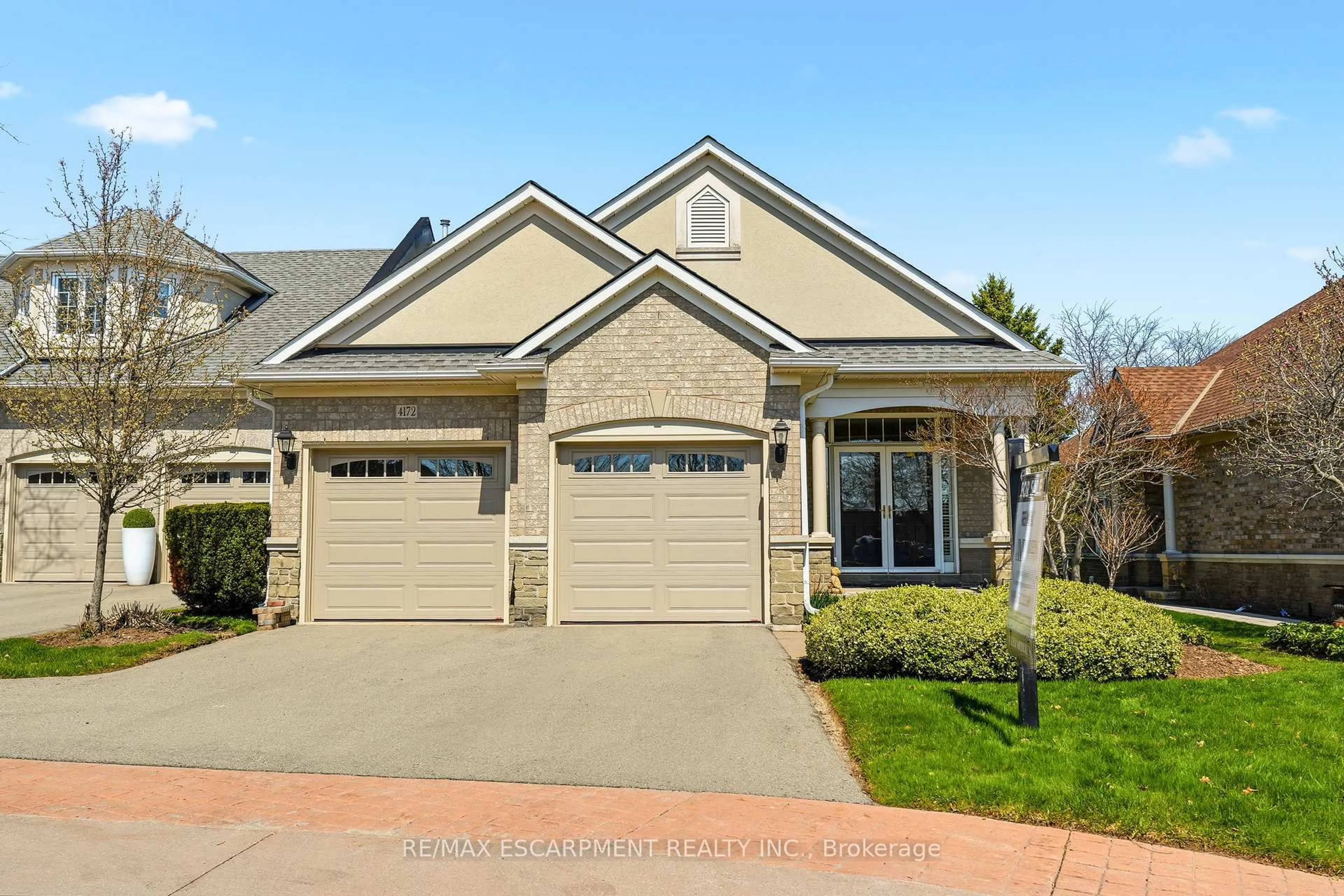 Home with brick exterior material, street for 4172 STONEBRIDGE Cres, Burlington Ontario L7M 4N2