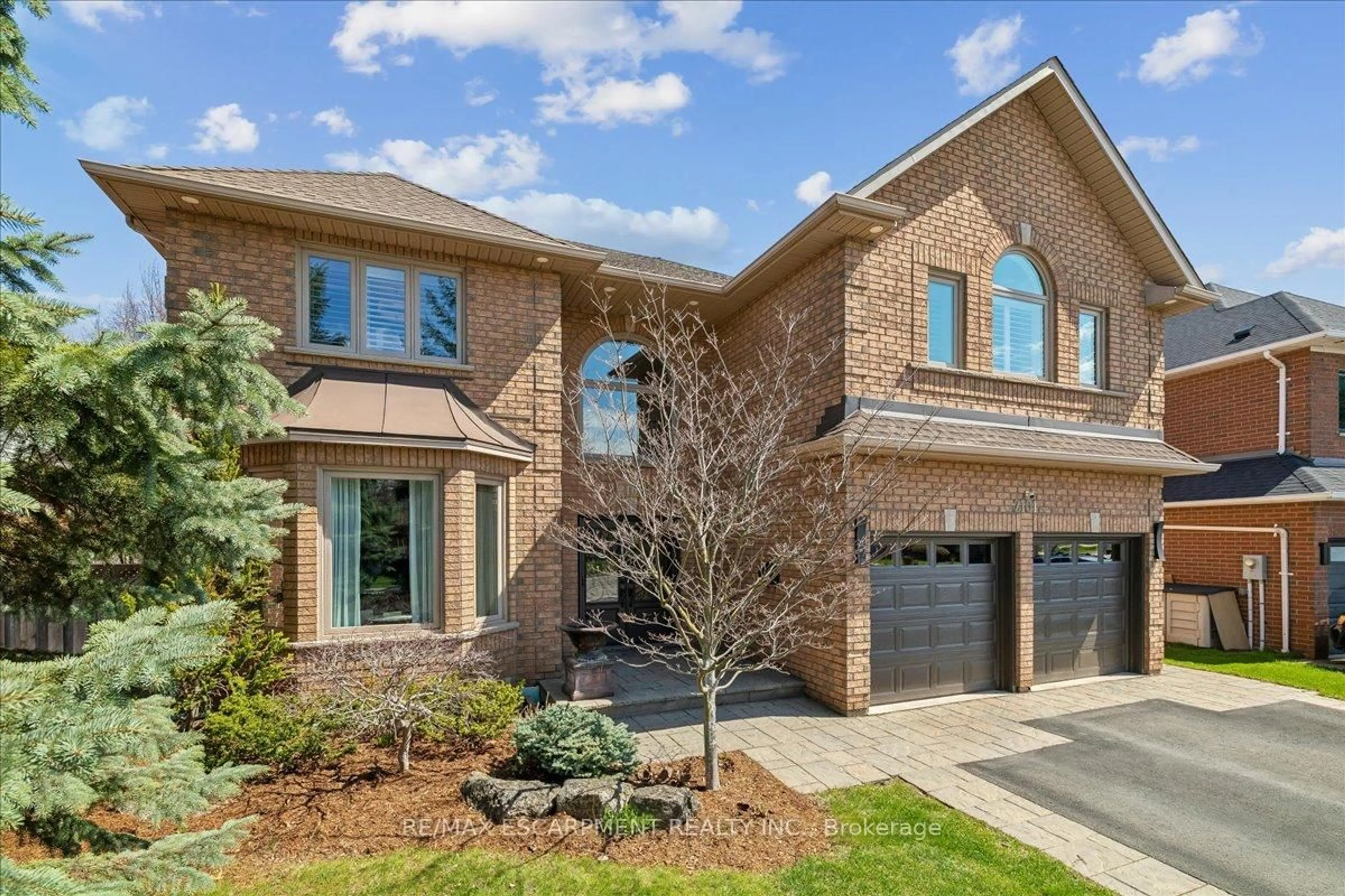 Home with brick exterior material, street for 2101 Westoak Trails Blvd, Oakville Ontario L6M 3L2