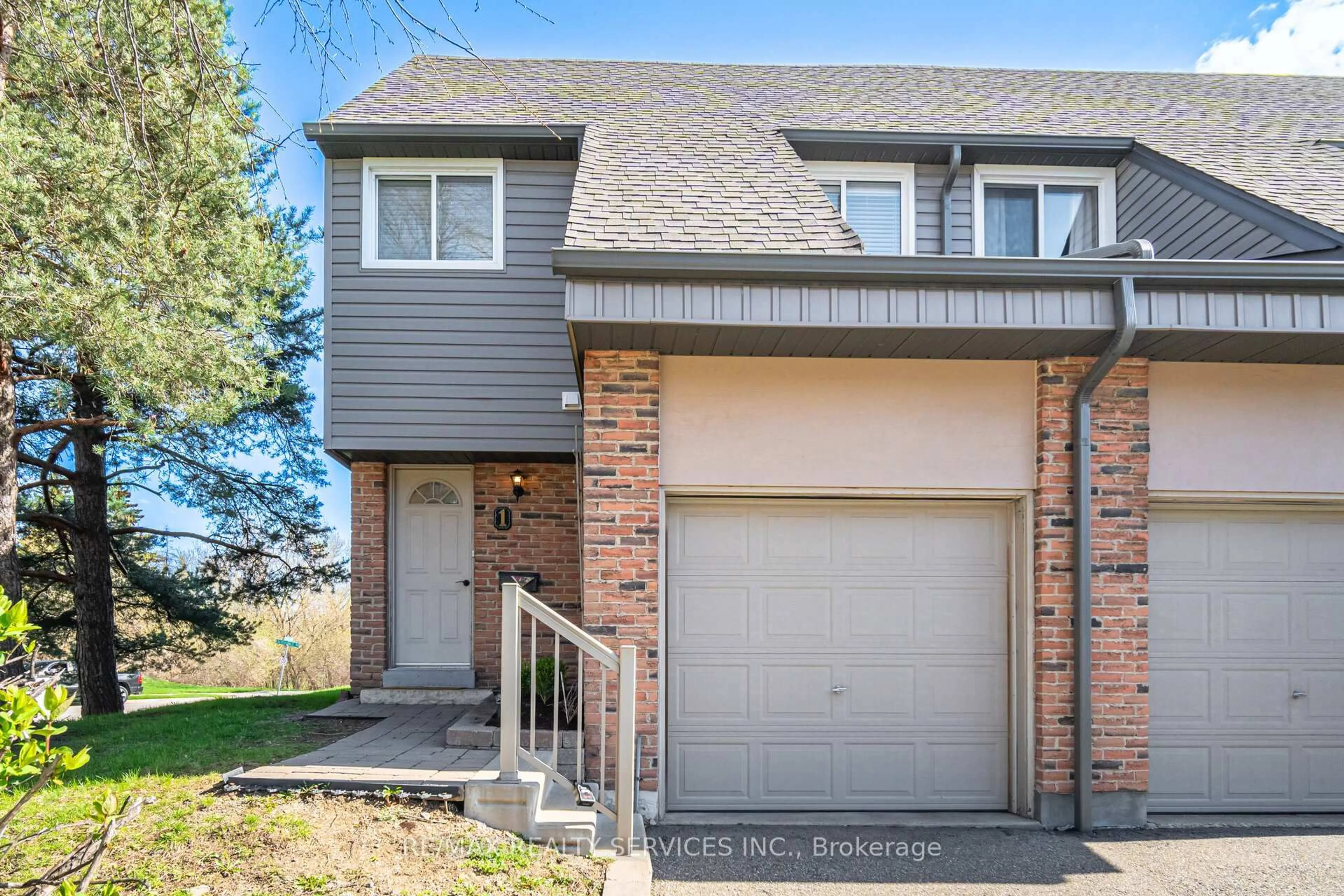 Home with brick exterior material, street for 1 Tara Park Cres #1, Brampton Ontario L6V 3E4