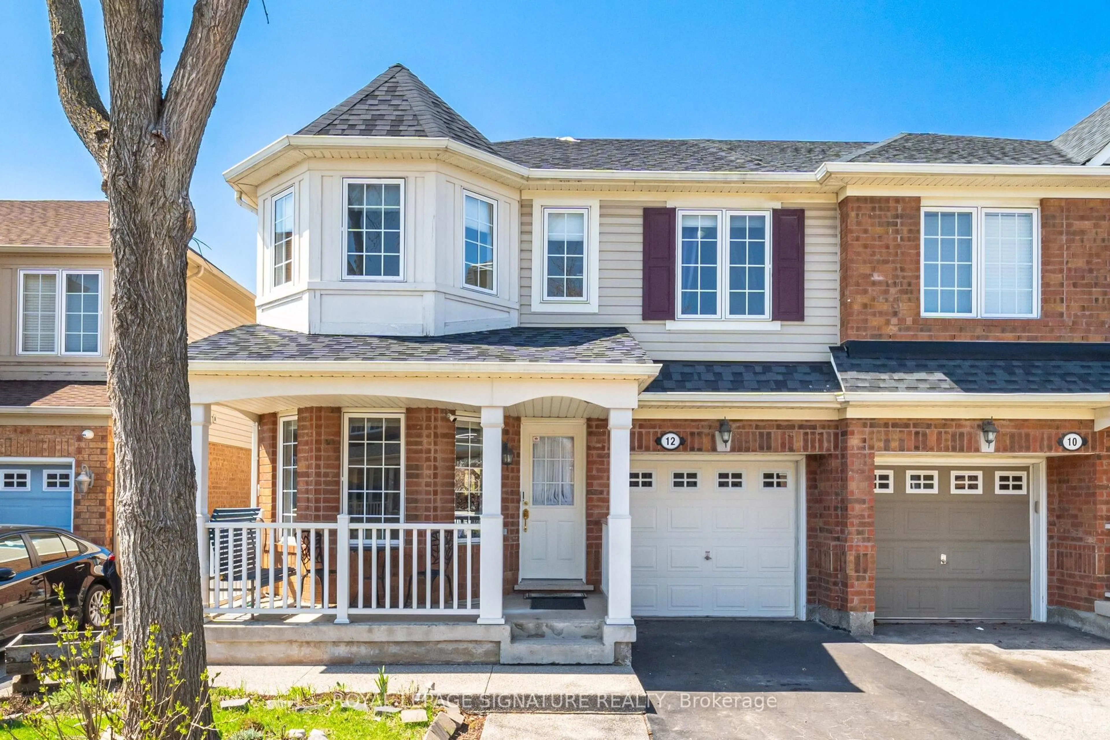 Home with brick exterior material, street for 12 Tawnie Cres, Brampton Ontario L6X 0L3