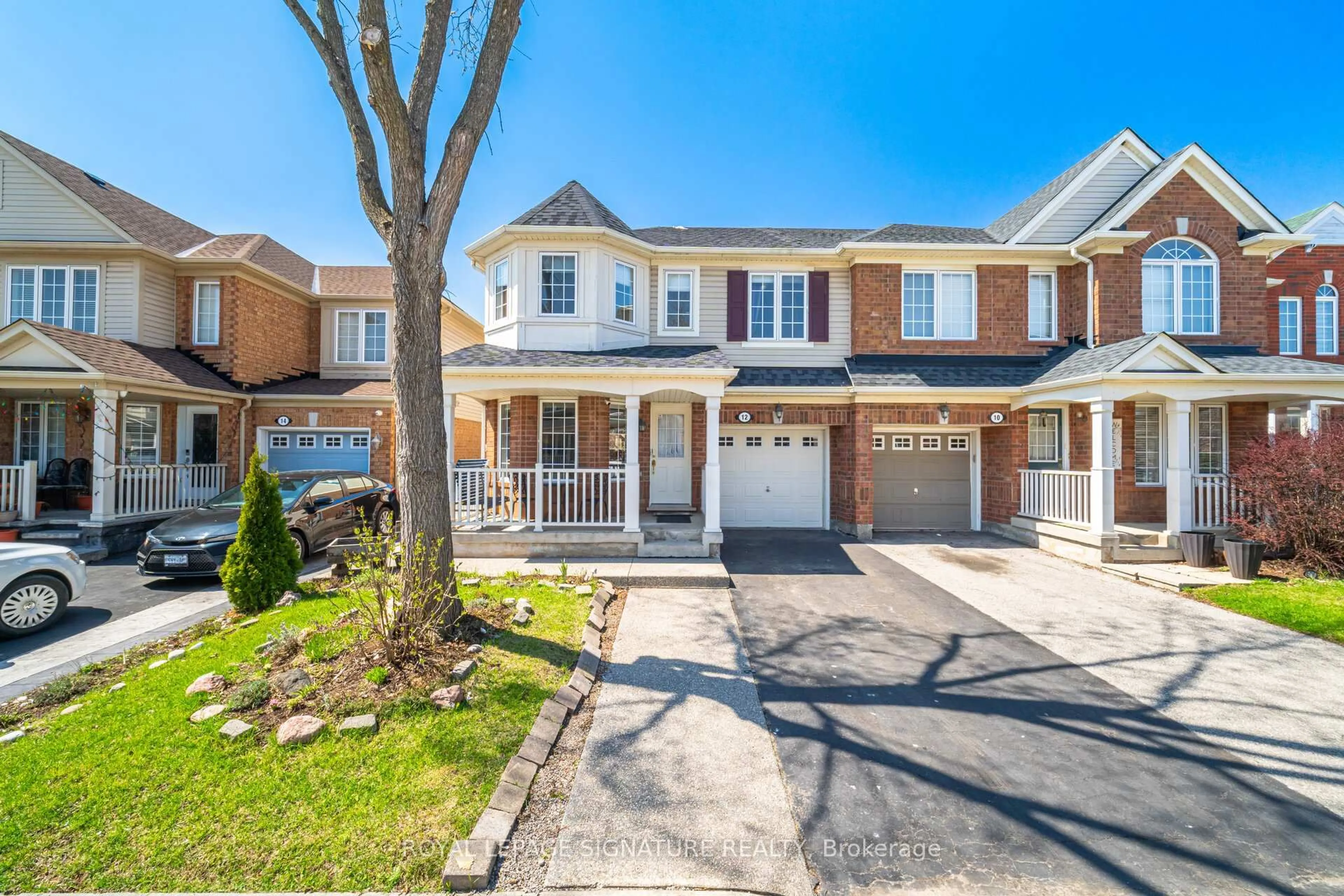 Home with brick exterior material, street for 12 Tawnie Cres, Brampton Ontario L6X 0L3
