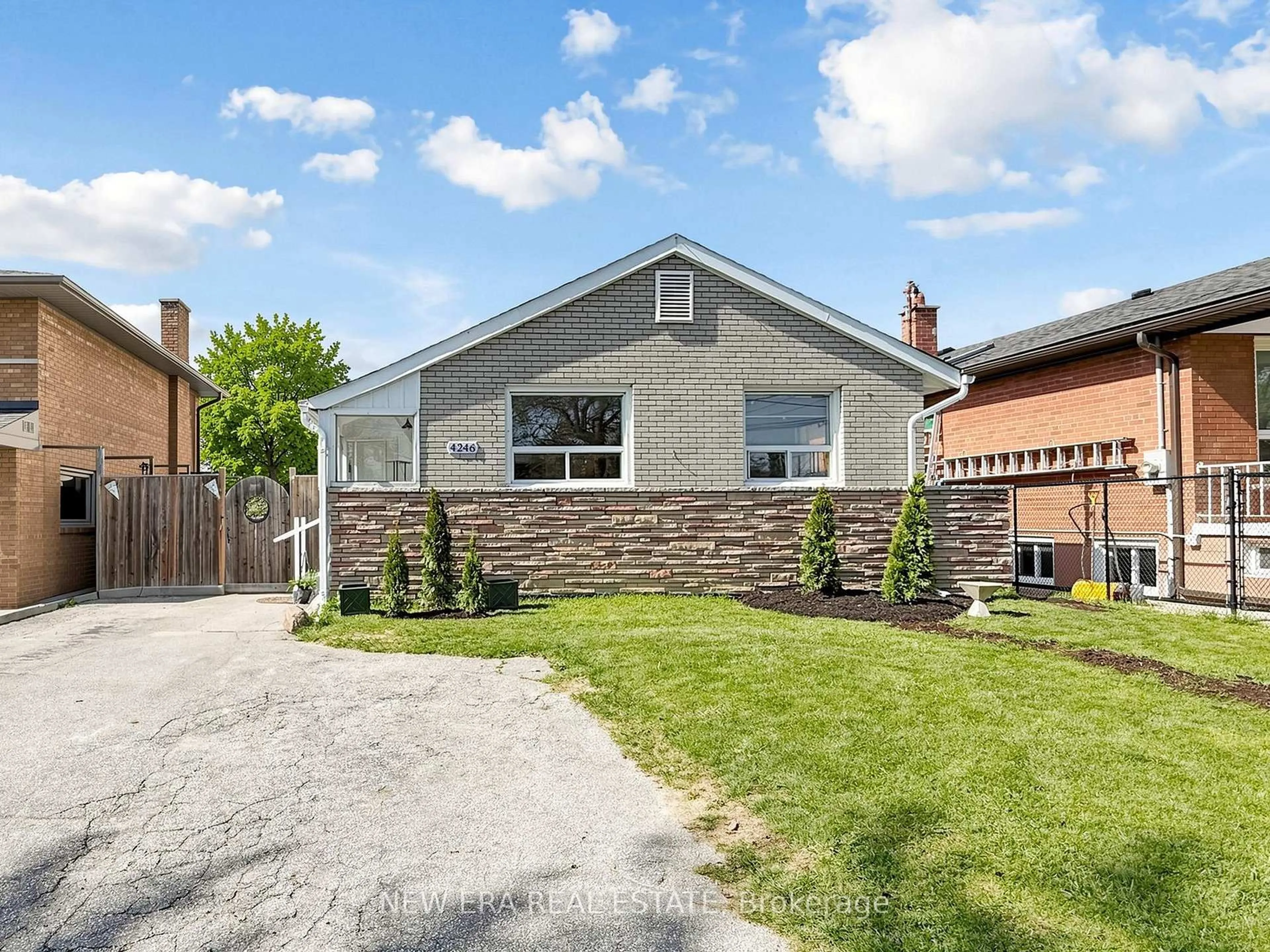 Home with brick exterior material, street for 4246 Bloor St, Toronto Ontario M9C 1Z7