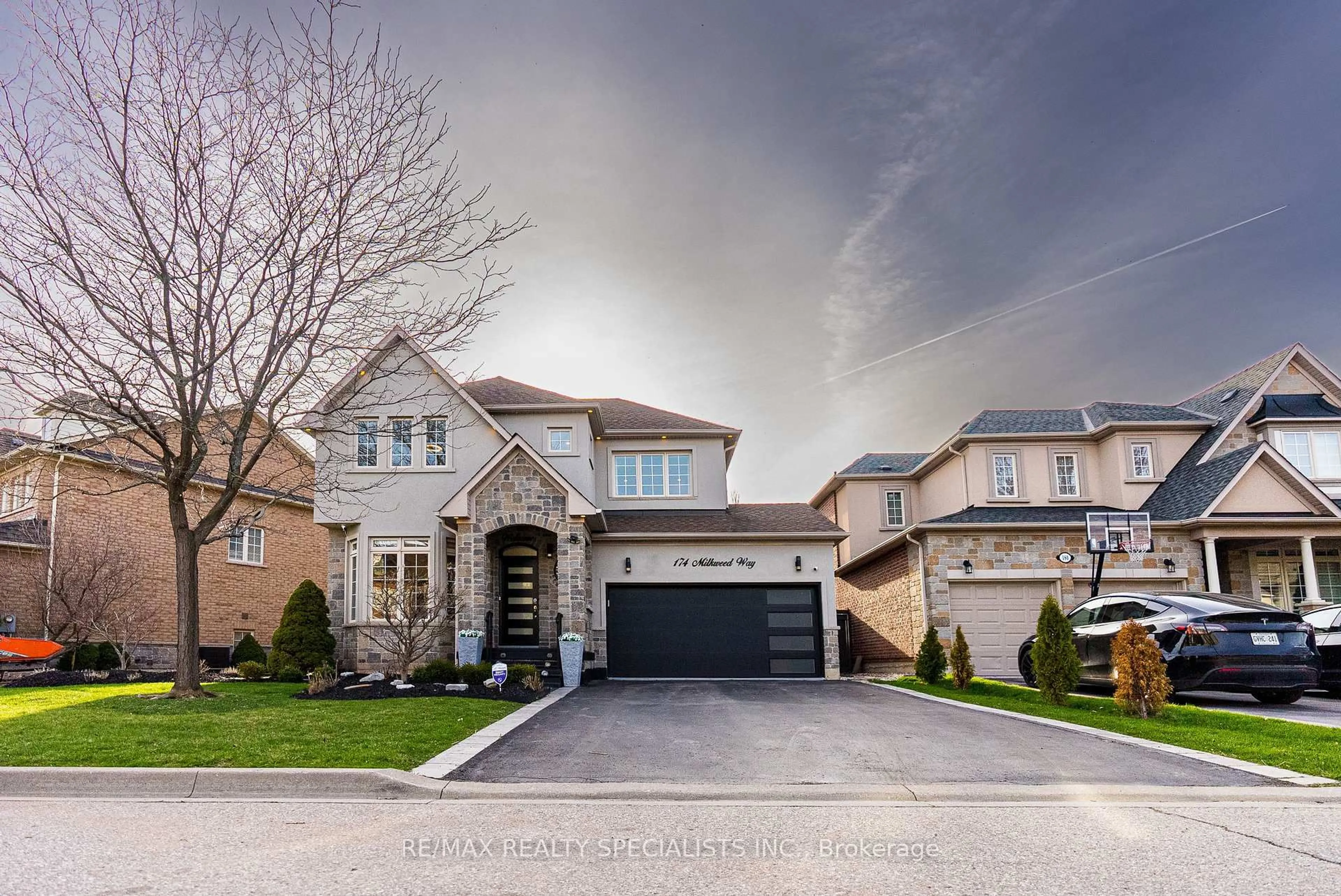 Home with brick exterior material, street for 174 Milkweed Way, Oakville Ontario L6L 0A4