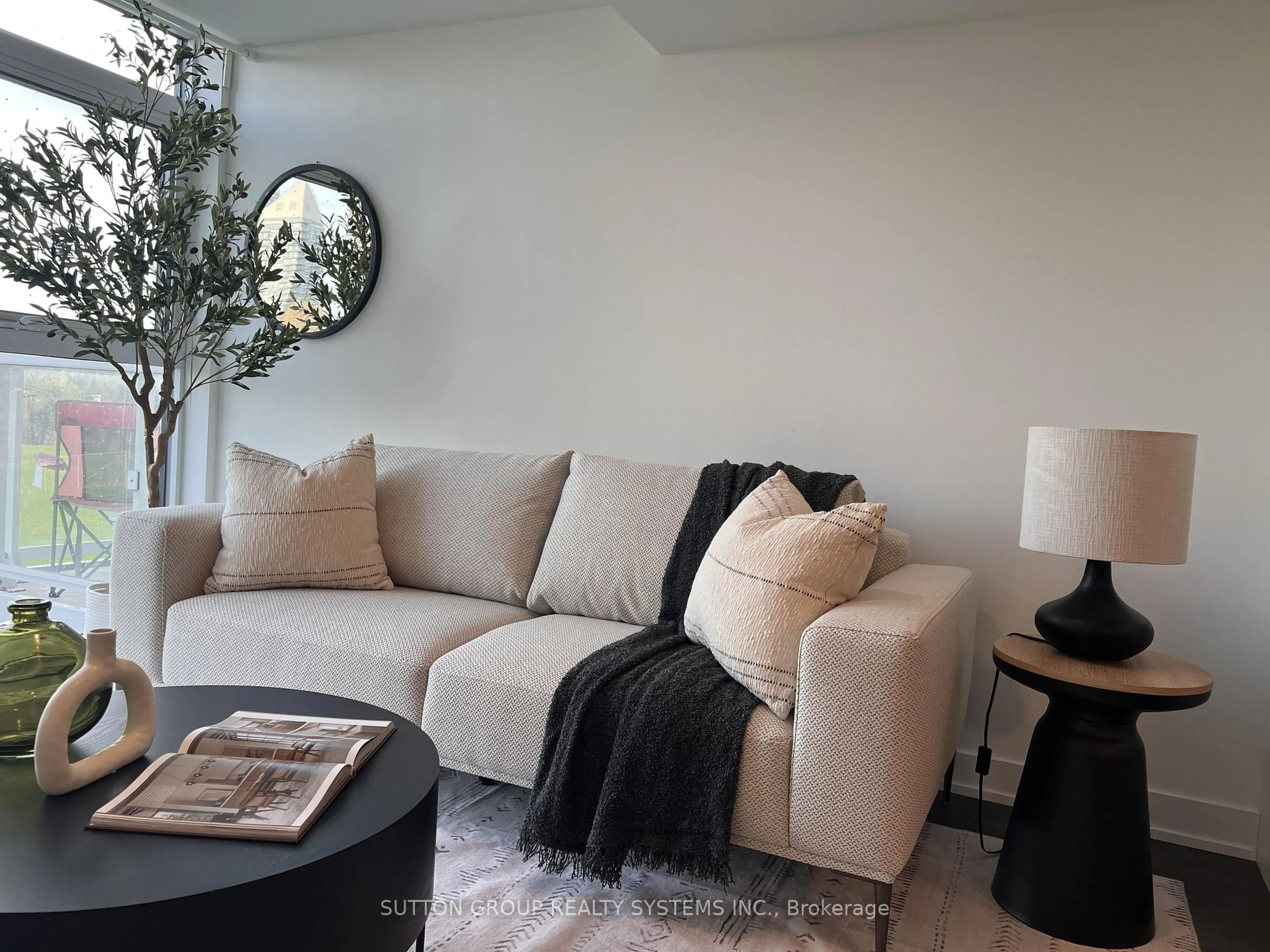 Living room with furniture, unknown for 251 Manitoba St #317, Toronto Ontario M8Y 0C7