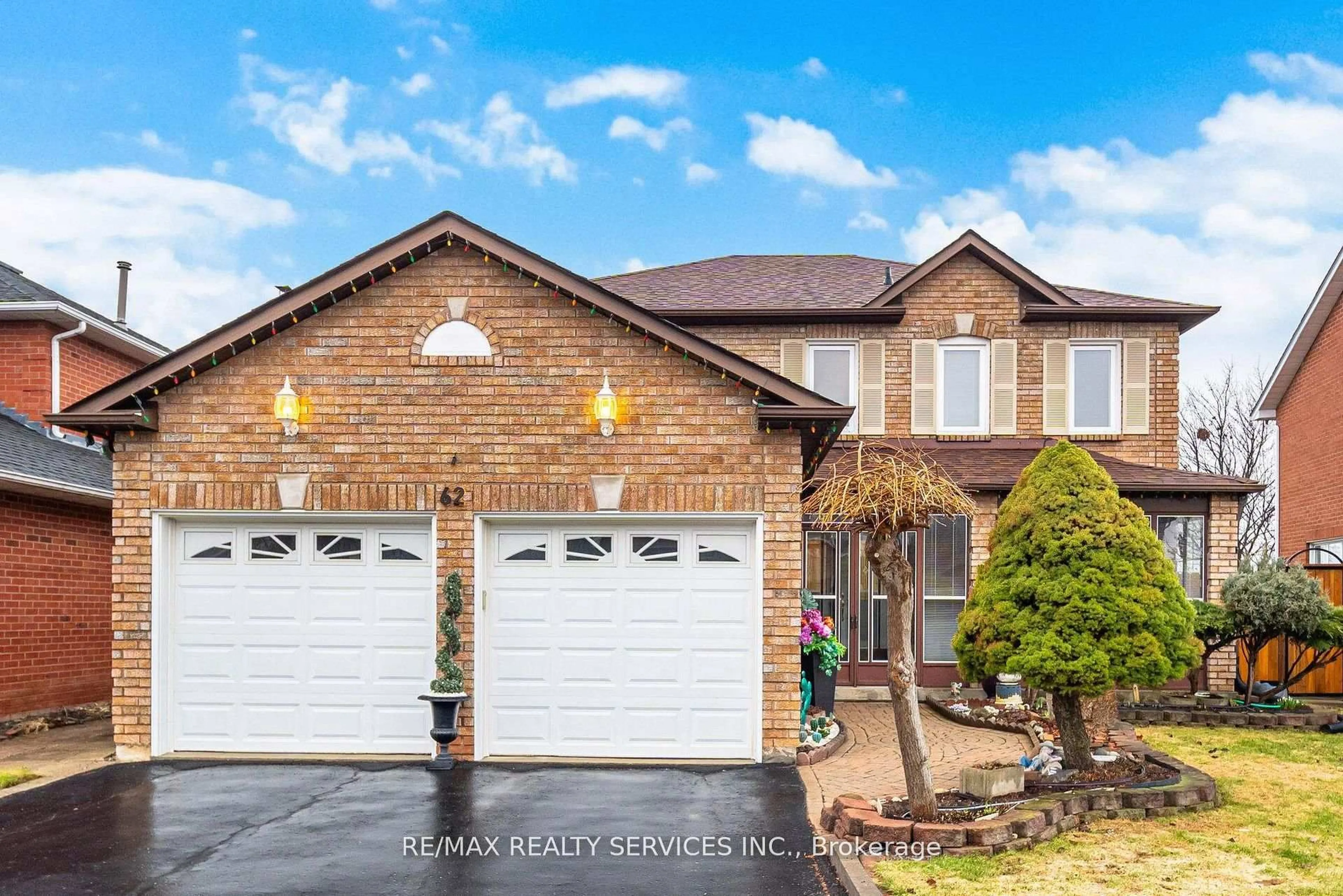 Home with brick exterior material, street for 62 Fernbrook Cres, Brampton Ontario L6Z 3N7