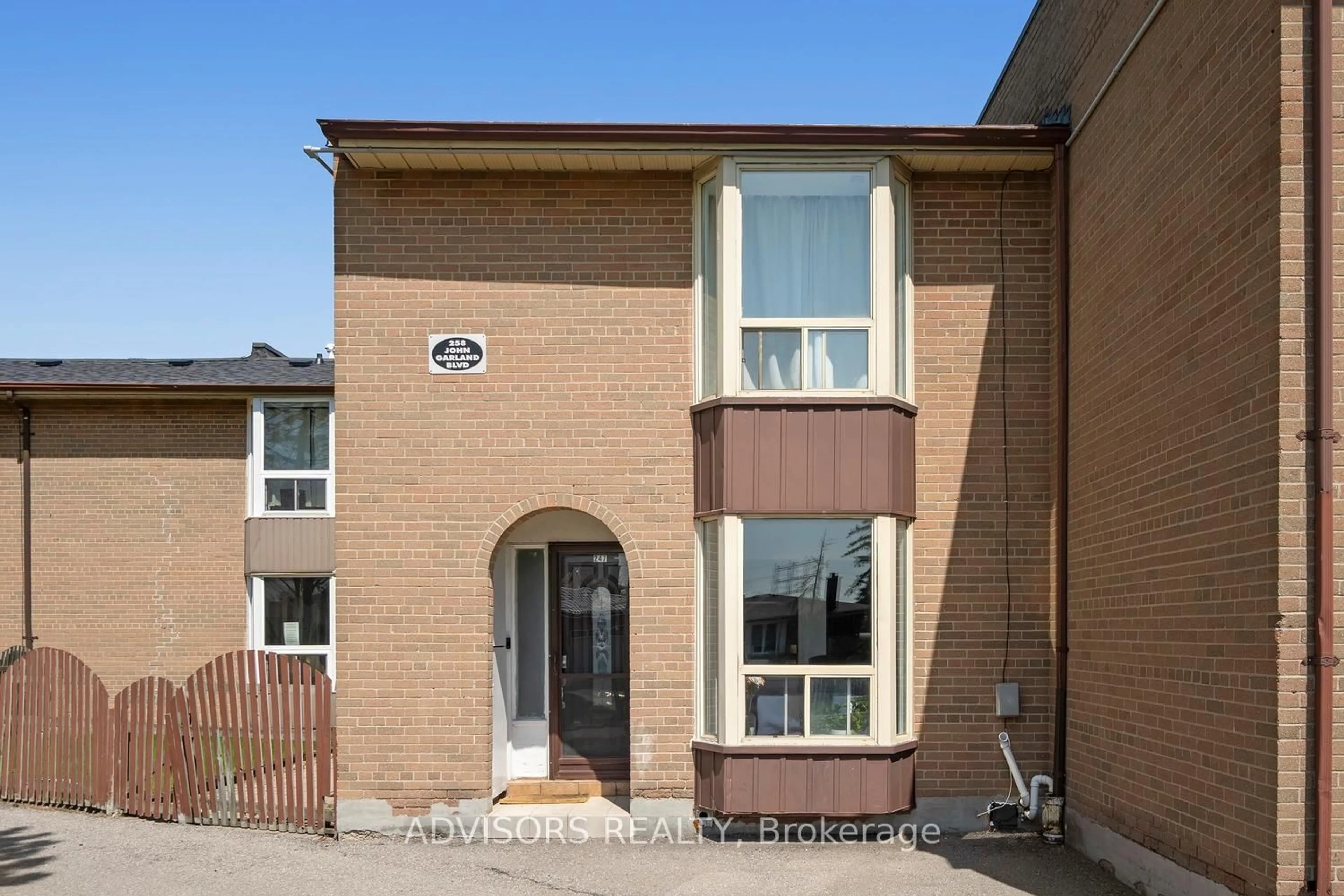 Home with brick exterior material, street for 258 John Garland Blvd #247, Toronto Ontario M9V 1N8