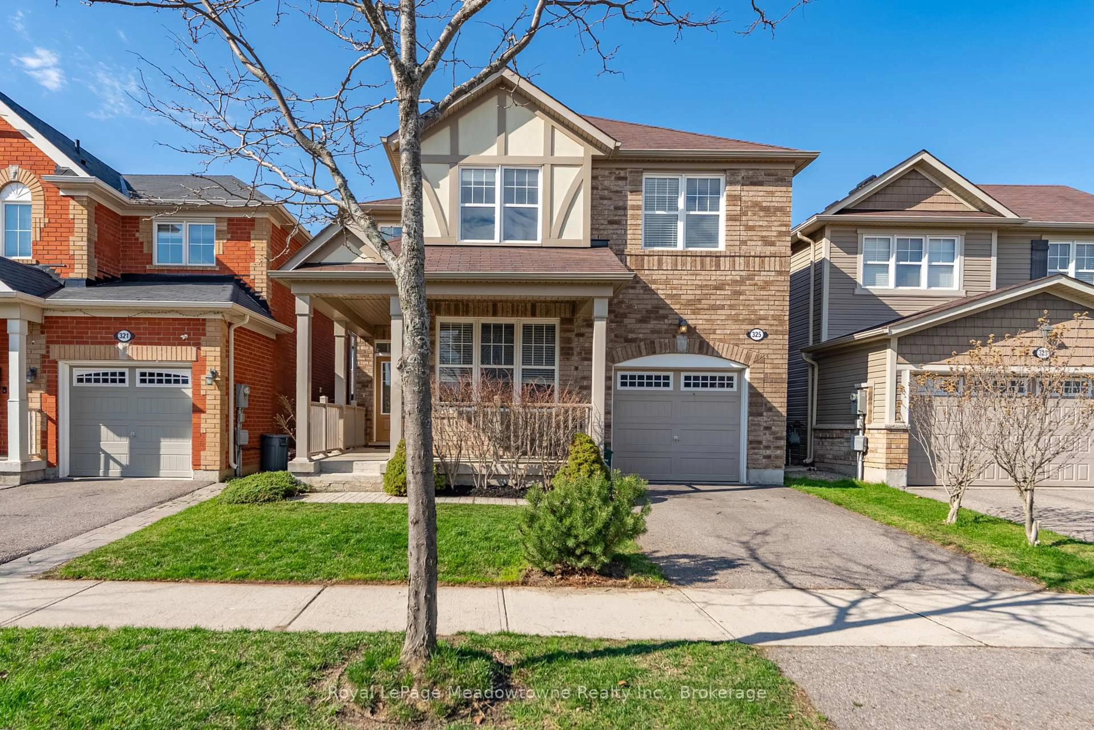 Home with brick exterior material, street for 325 Gleave Terr, Milton Ontario L9T 8P1