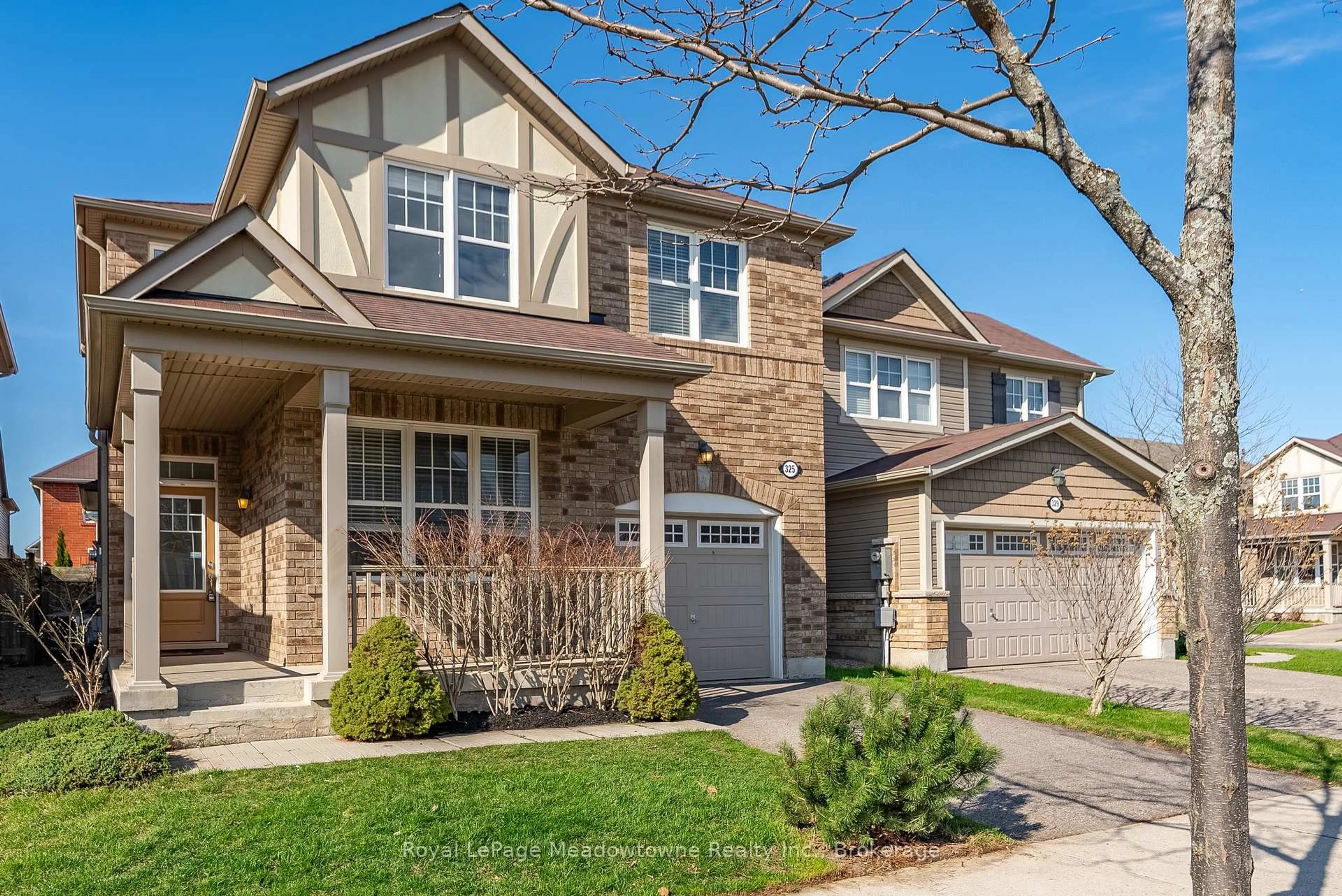 Home with brick exterior material, street for 325 Gleave Terr, Milton Ontario L9T 8P1