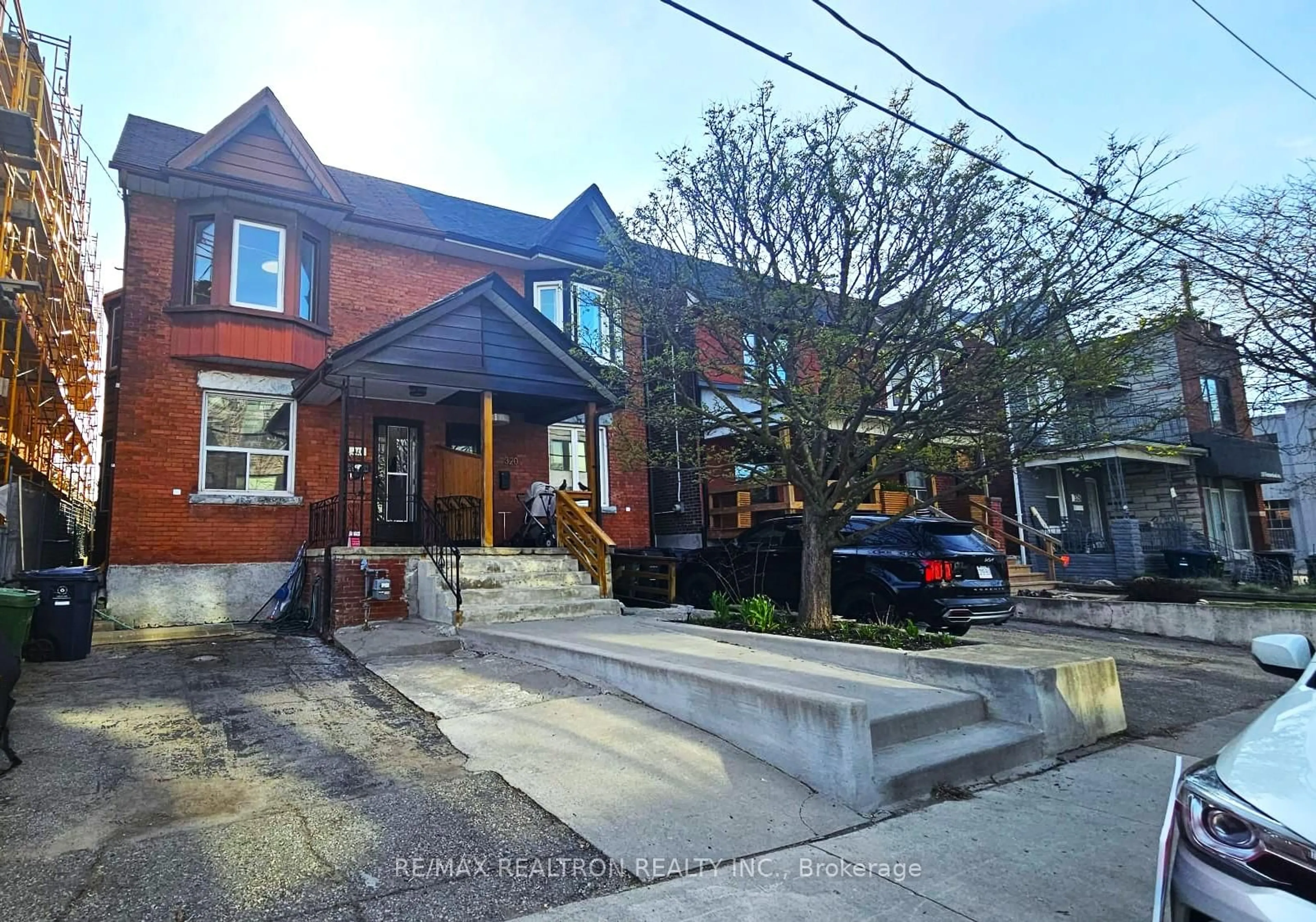 Home with brick exterior material, street for 318 Westmoreland Ave, Toronto Ontario M6H 3A5