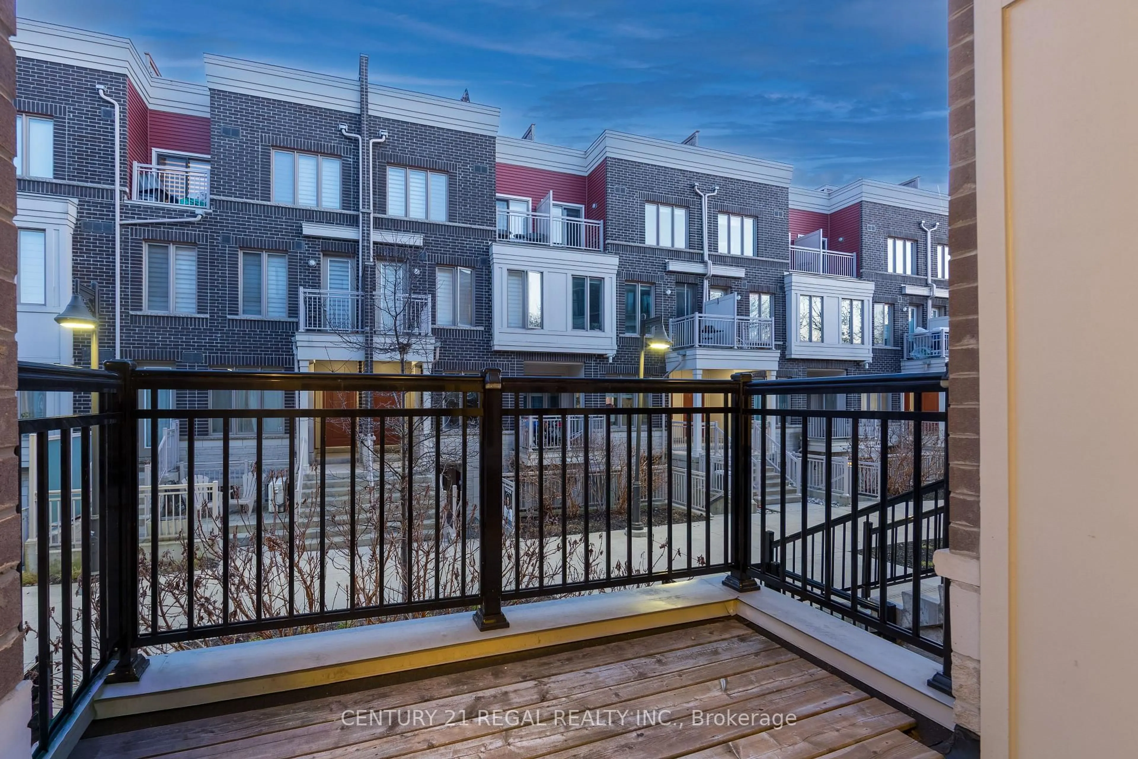 Patio, city buildings view from balcony for 150 Long Branch Ave #21, Toronto Ontario M8W 0A9
