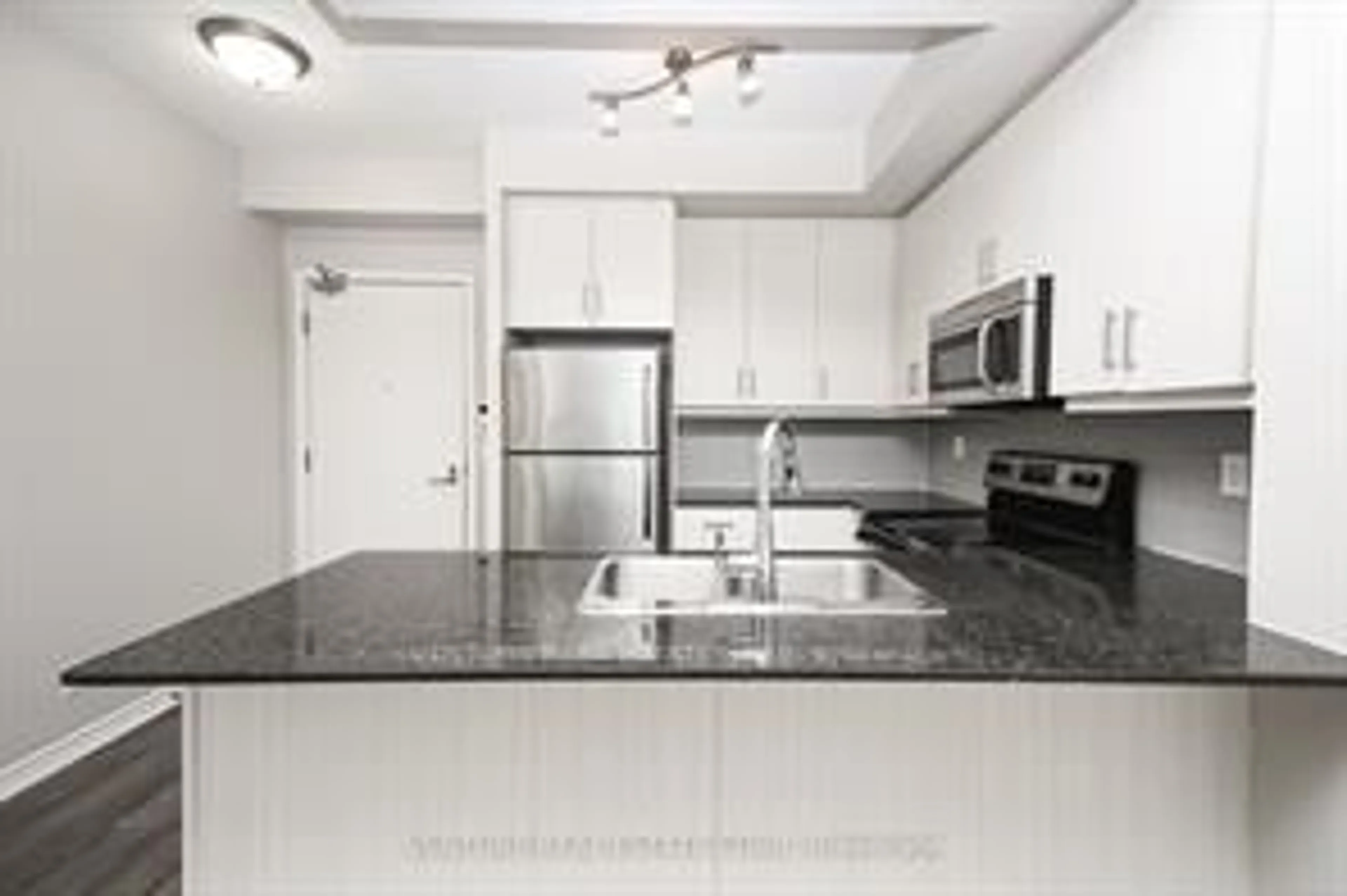 Standard kitchen, unknown for 15 James Finlay Way #824, Toronto Ontario M3M 0B3