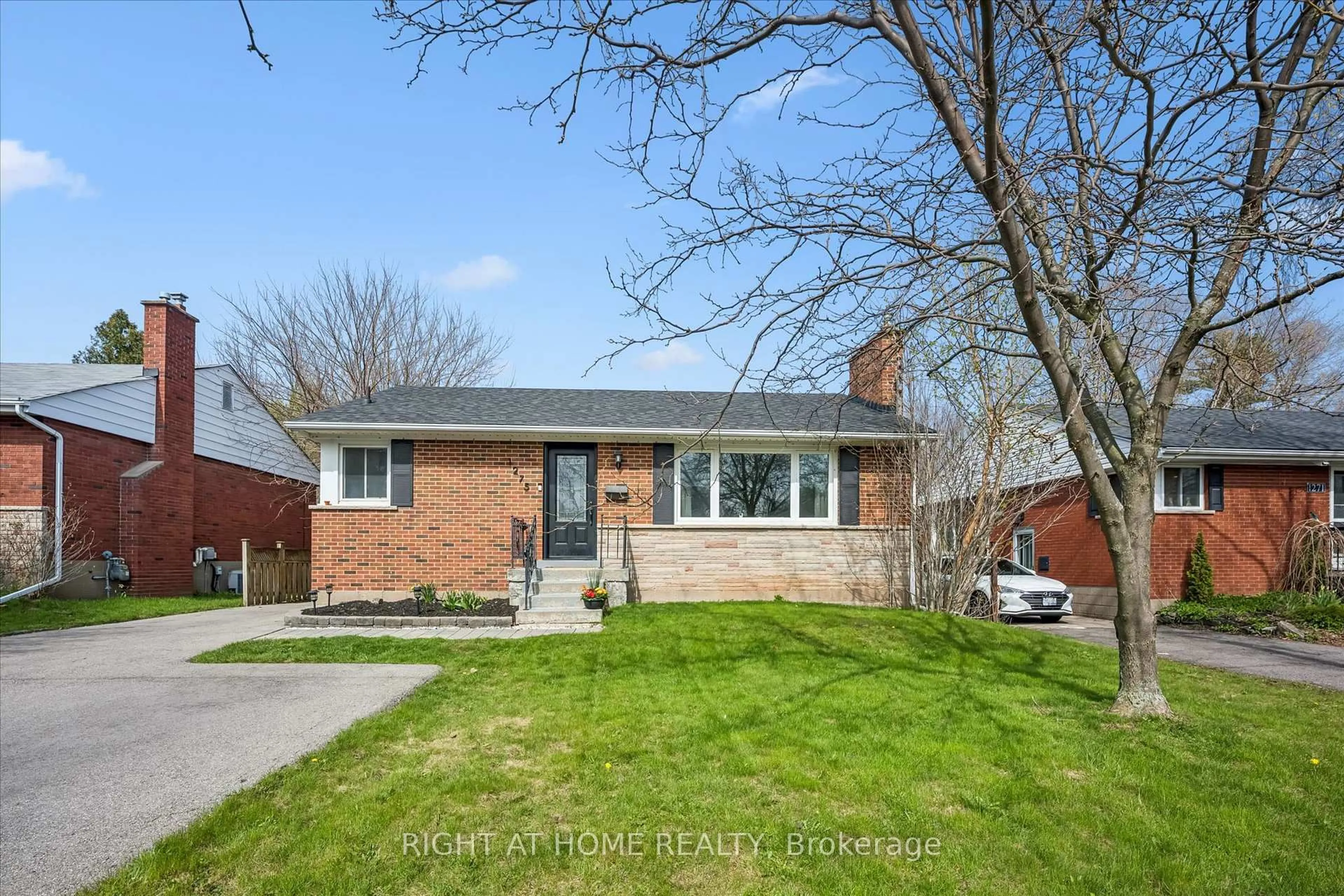 Home with brick exterior material, street for 1275 Royal Dr, Burlington Ontario L7P 2G2