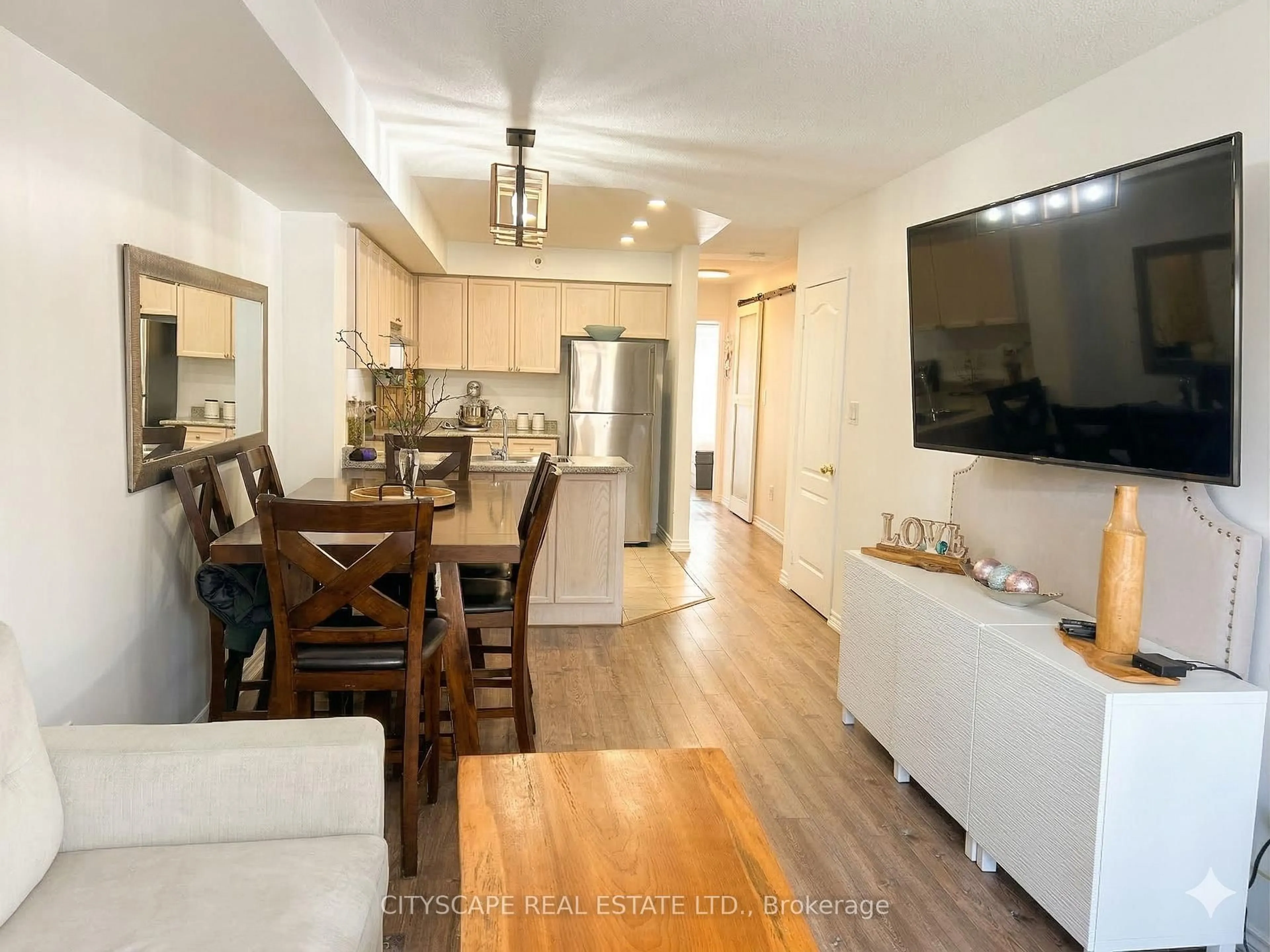 Open concept kitchen, wood/laminate floor for 601 Shoreline Dr #162, Mississauga Ontario L5B 4K1