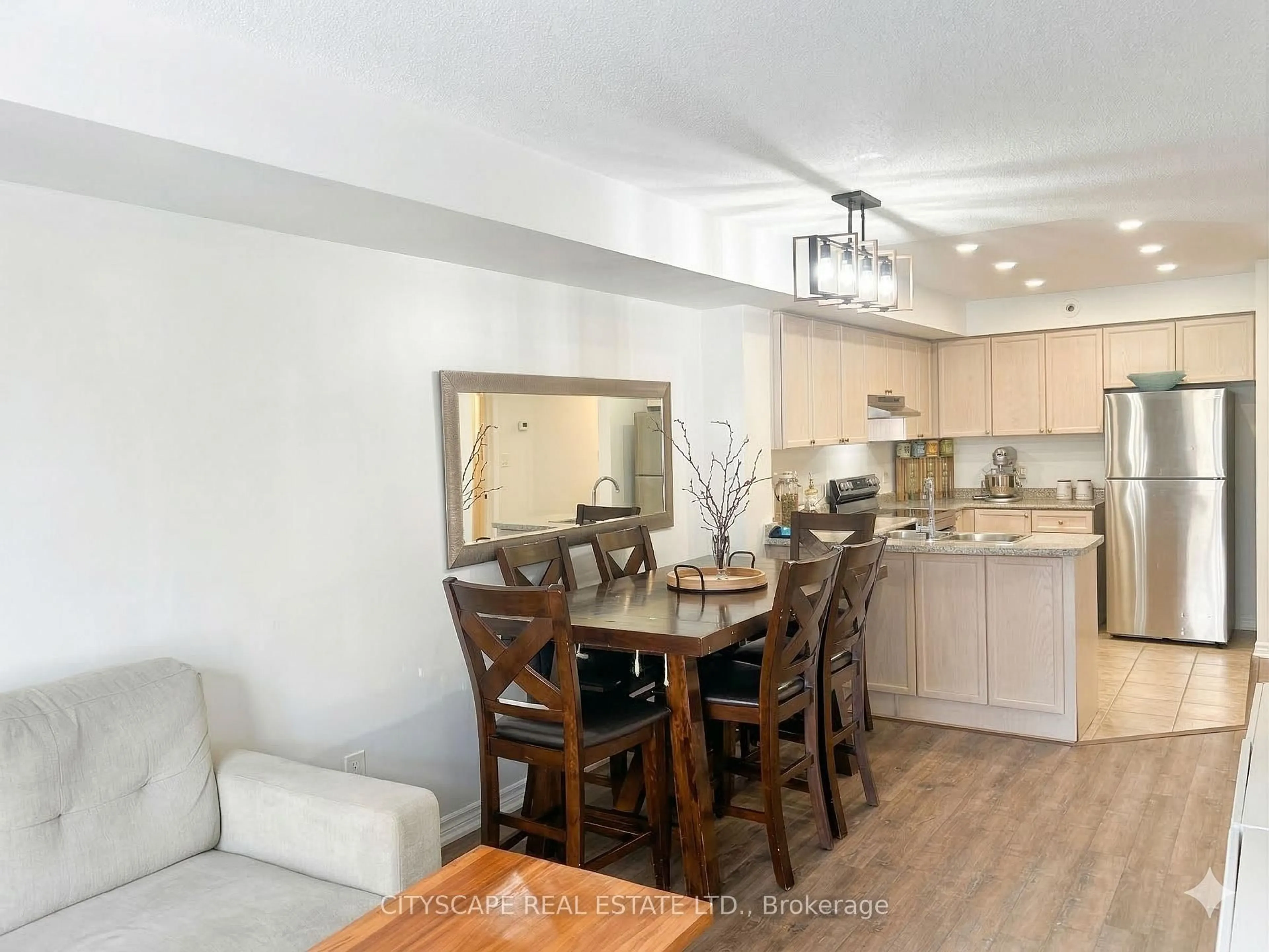 Open concept kitchen, wood/laminate floor for 601 Shoreline Dr #162, Mississauga Ontario L5B 4K1