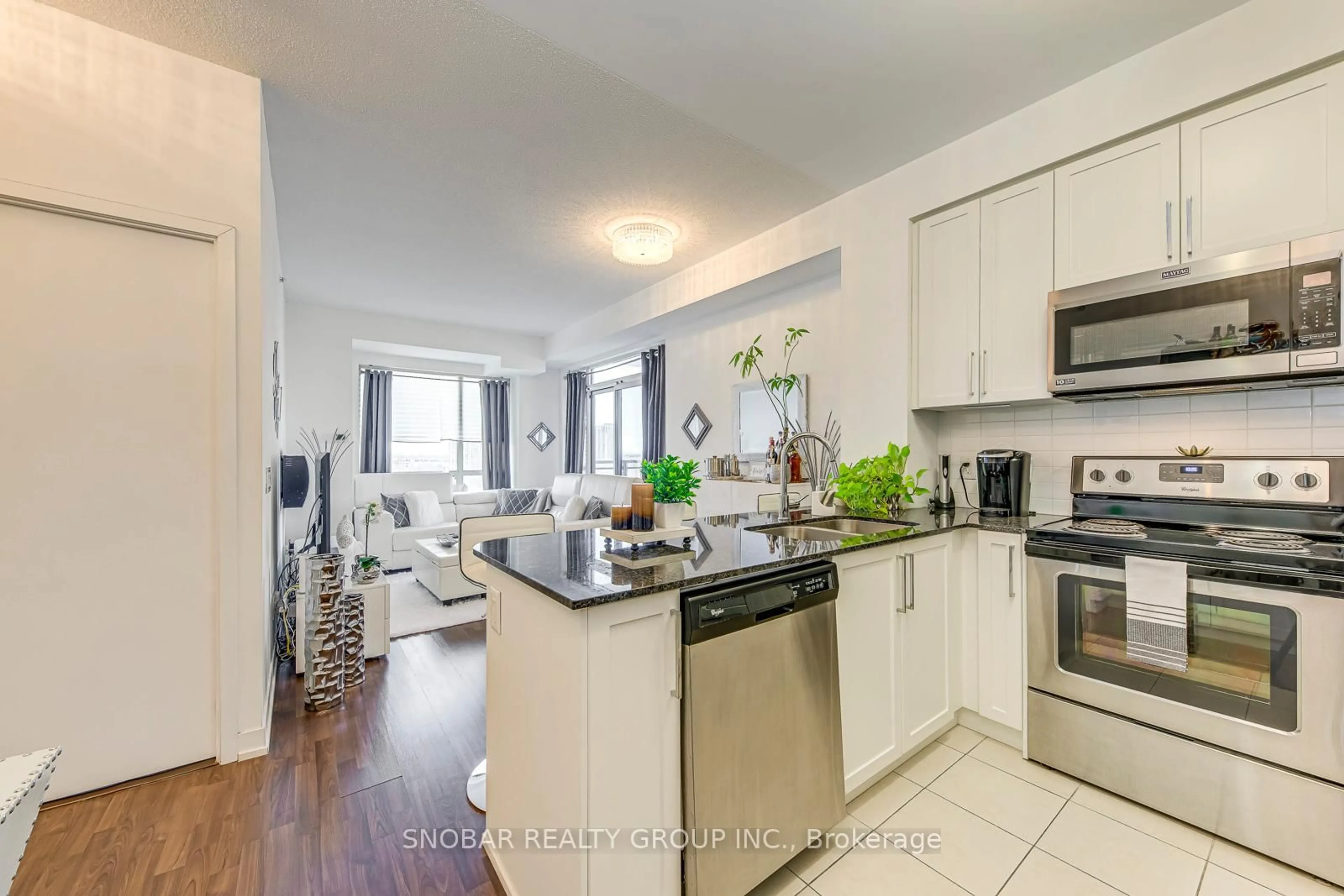 Open concept kitchen, unknown for 840 Queens Plate Dr #704, Toronto Ontario M9W 0E7