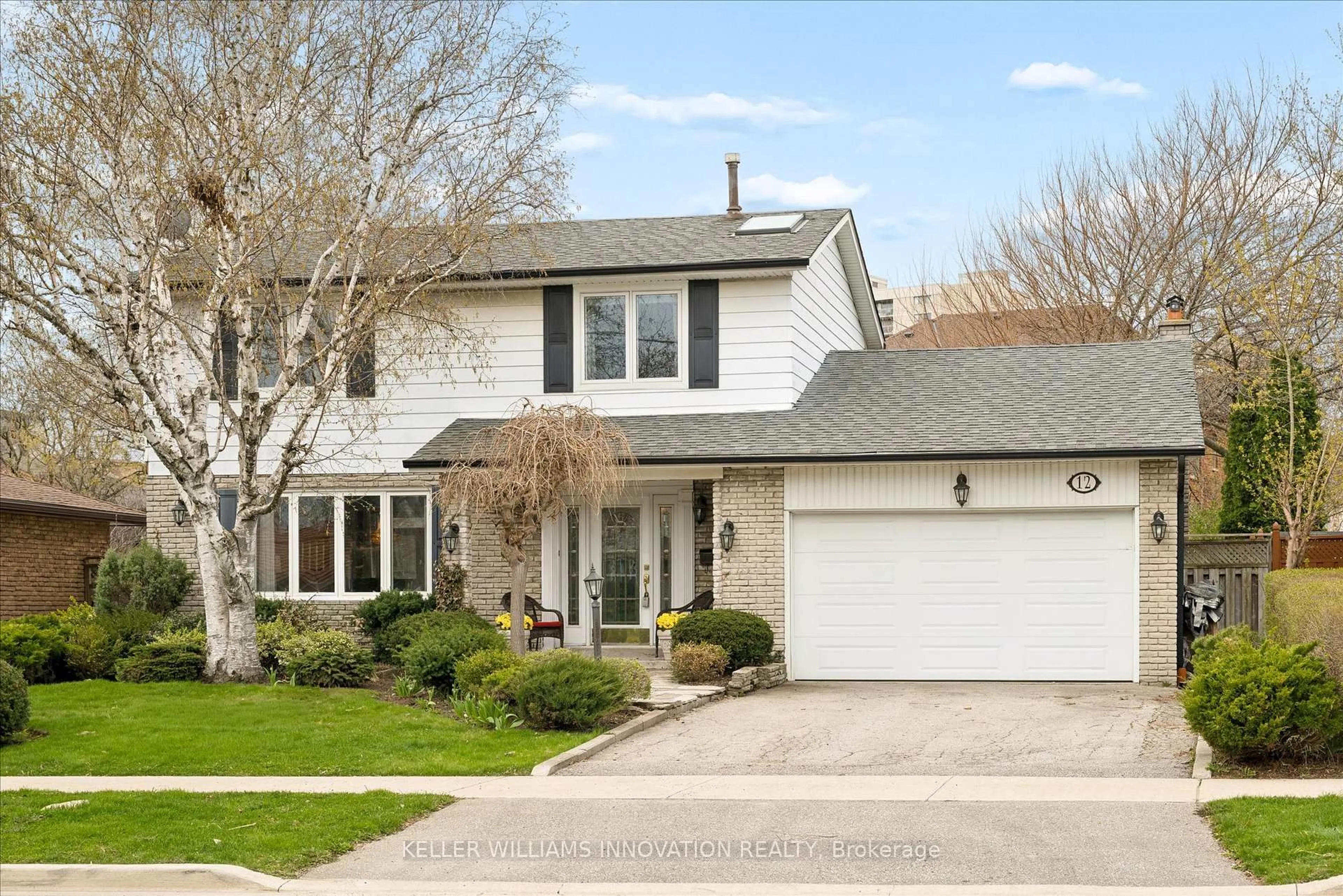 Home with vinyl exterior material, street for 12 Burnhamill Pl, Toronto Ontario M9C 3S4